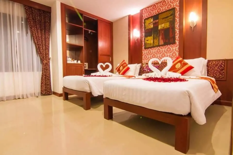 Bed in Patong Hemingways Hotel