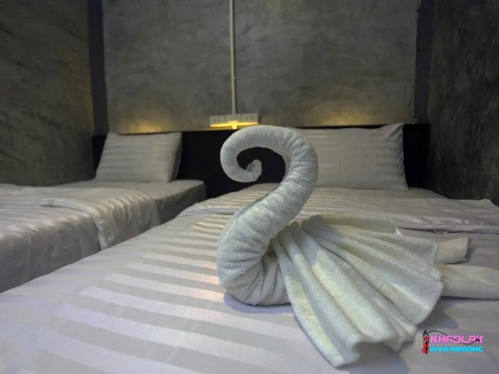 Bed in Khaolak Dive Resort