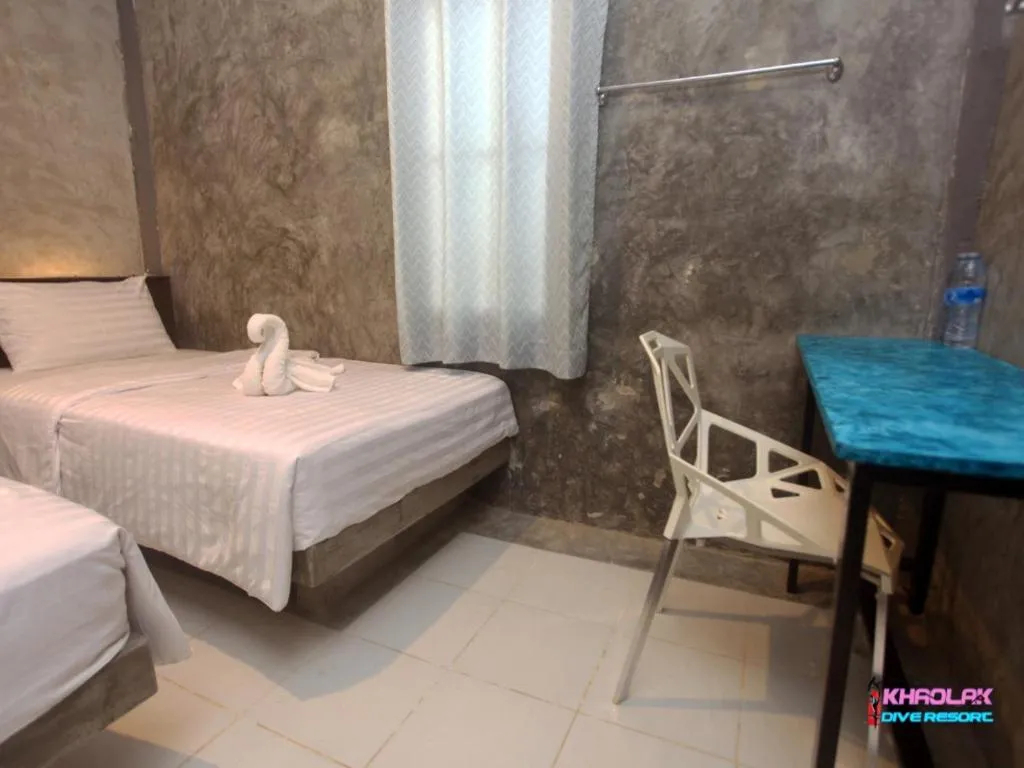 Bed in Khaolak Dive Resort