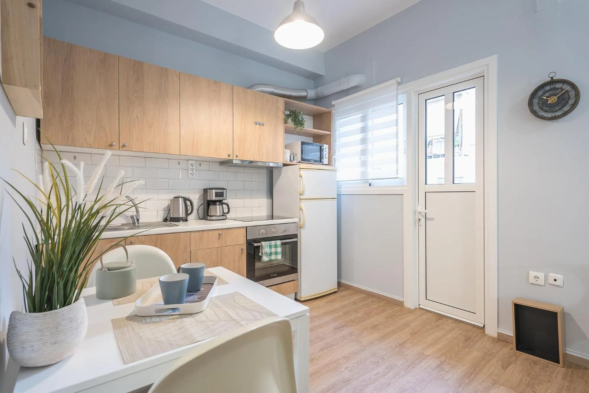 Coffee/tea facilities in City Nest Apartment by Cloudkeys