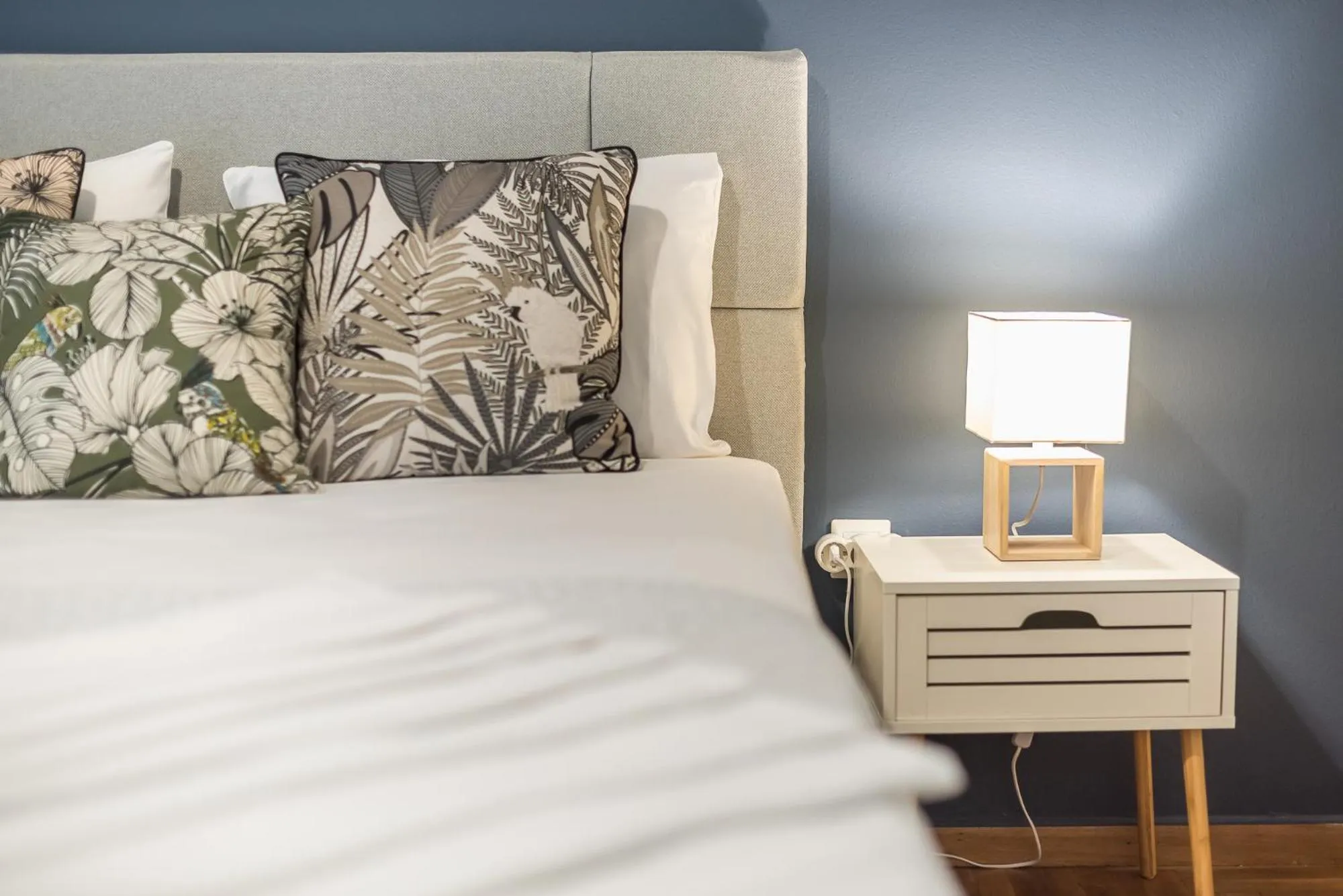 Bed in City Nest Apartment by Cloudkeys