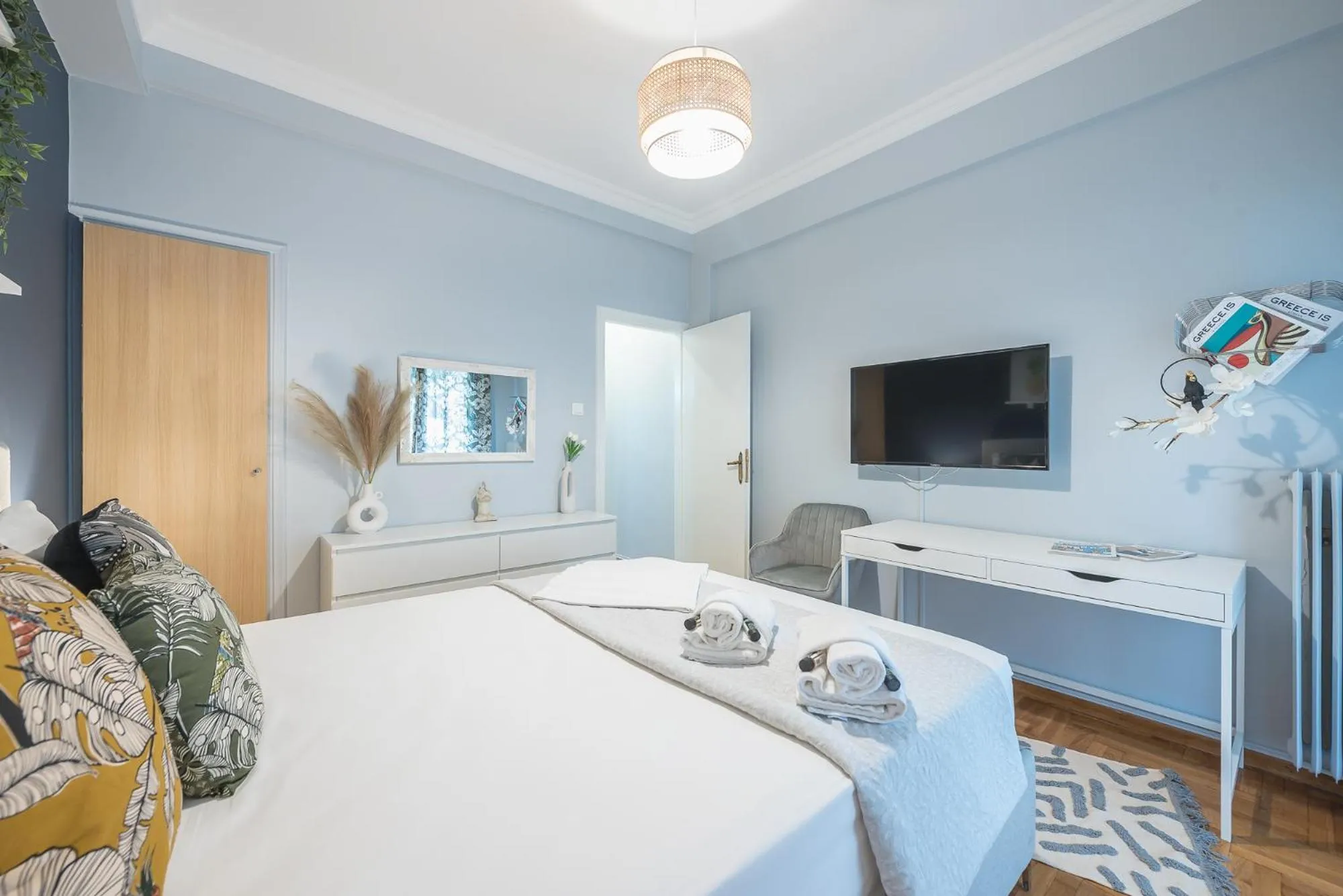 Bed in City Nest Apartment by Cloudkeys