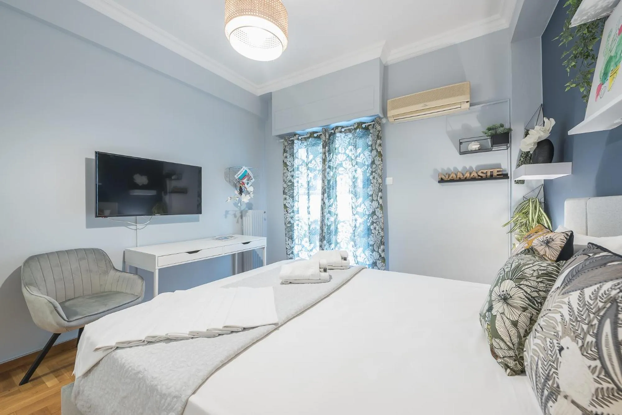 Bed in City Nest Apartment by Cloudkeys