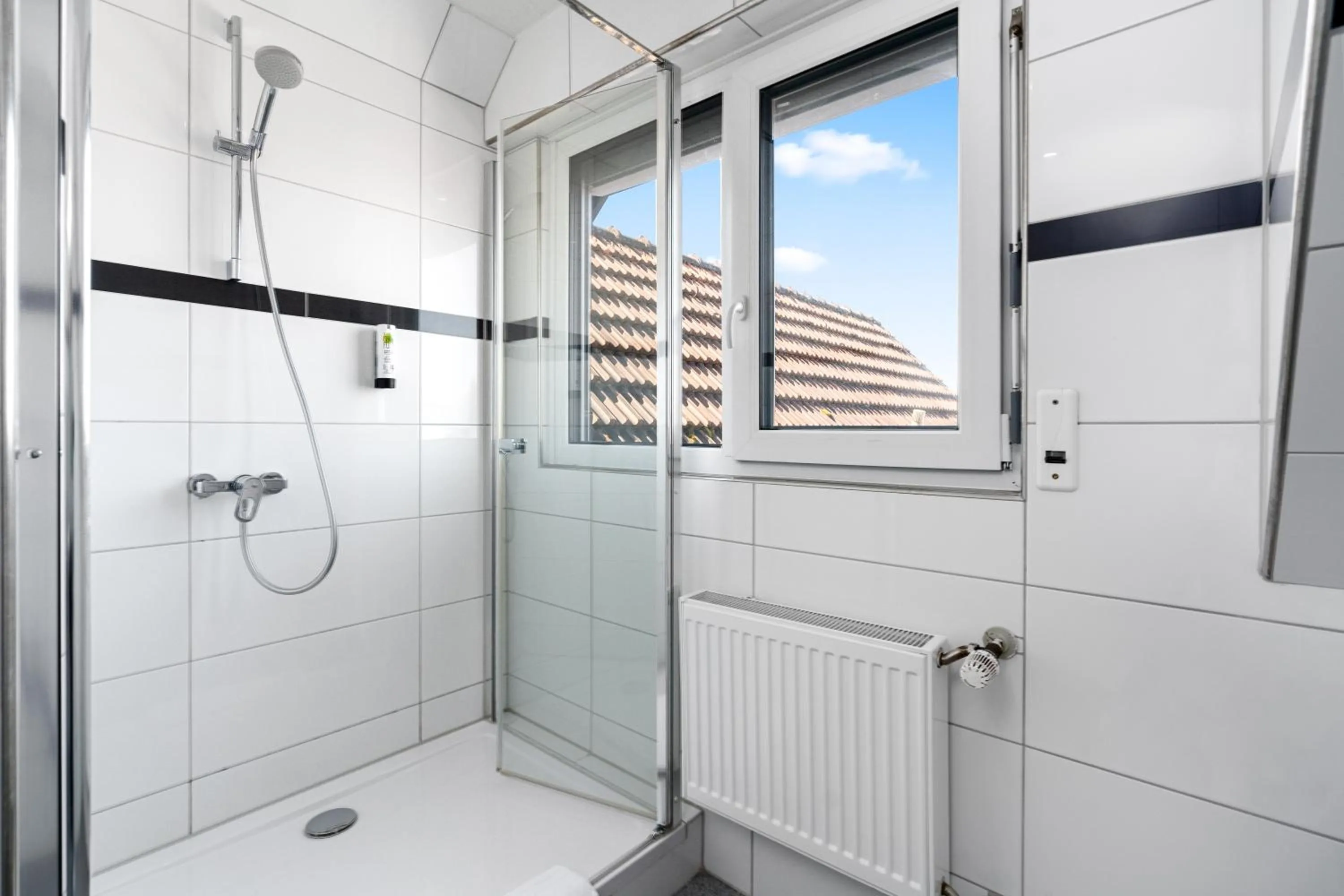 Bathroom in Hotel Adler