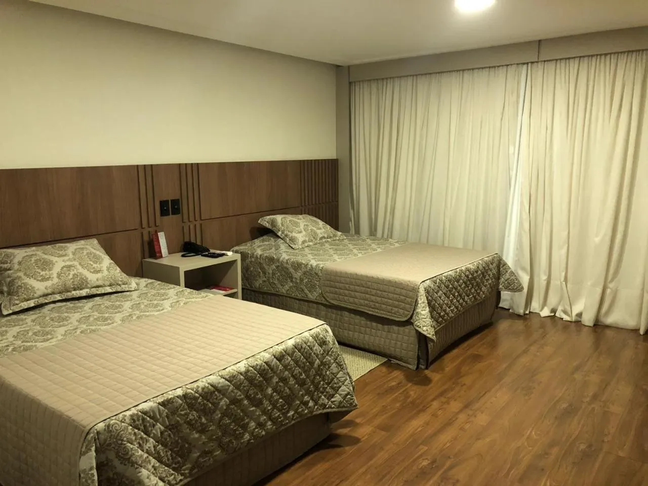 Bed in Mogano Premium Hotel - ELETROPOSTO