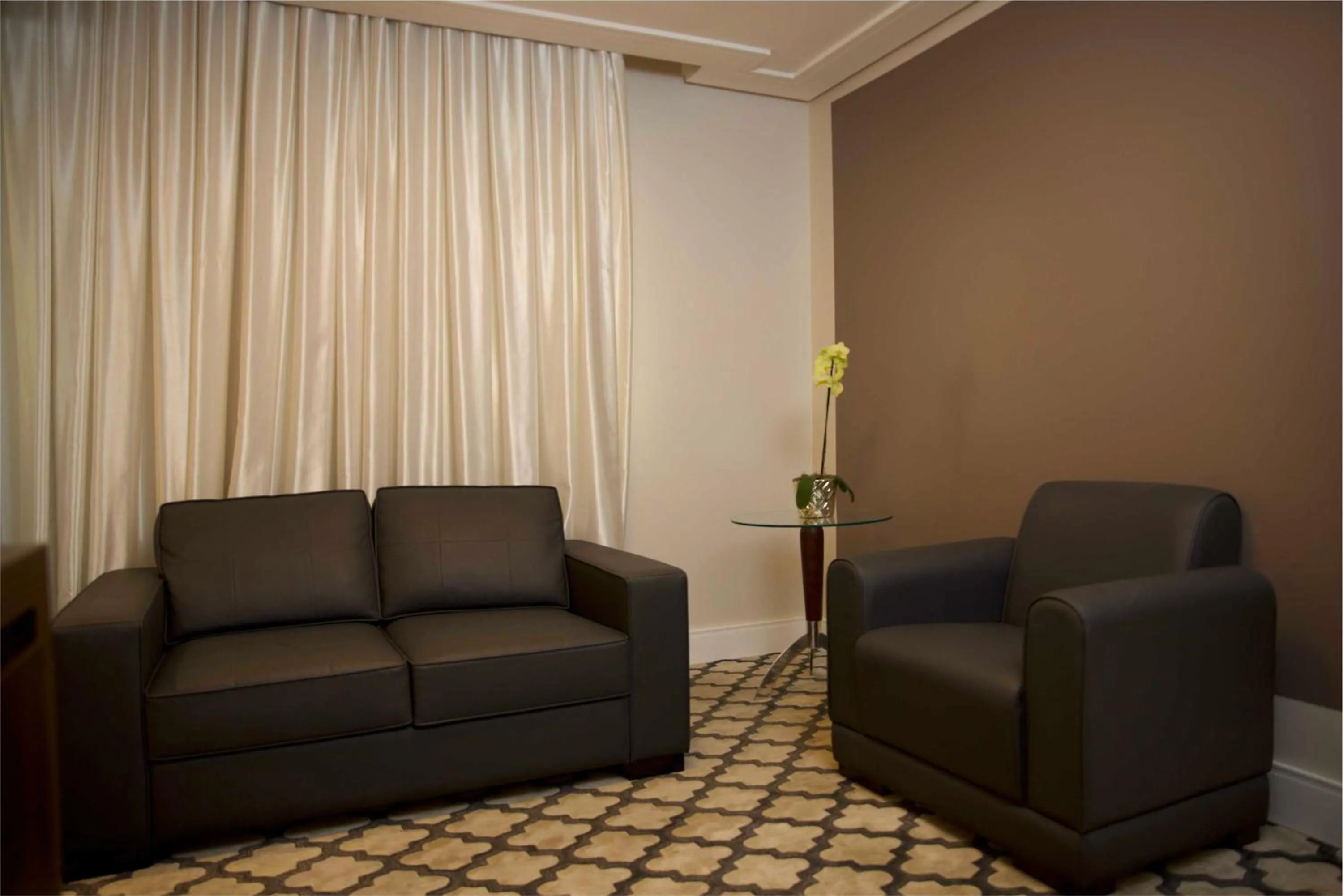 Living room in Mogano Premium Hotel - ELETROPOSTO