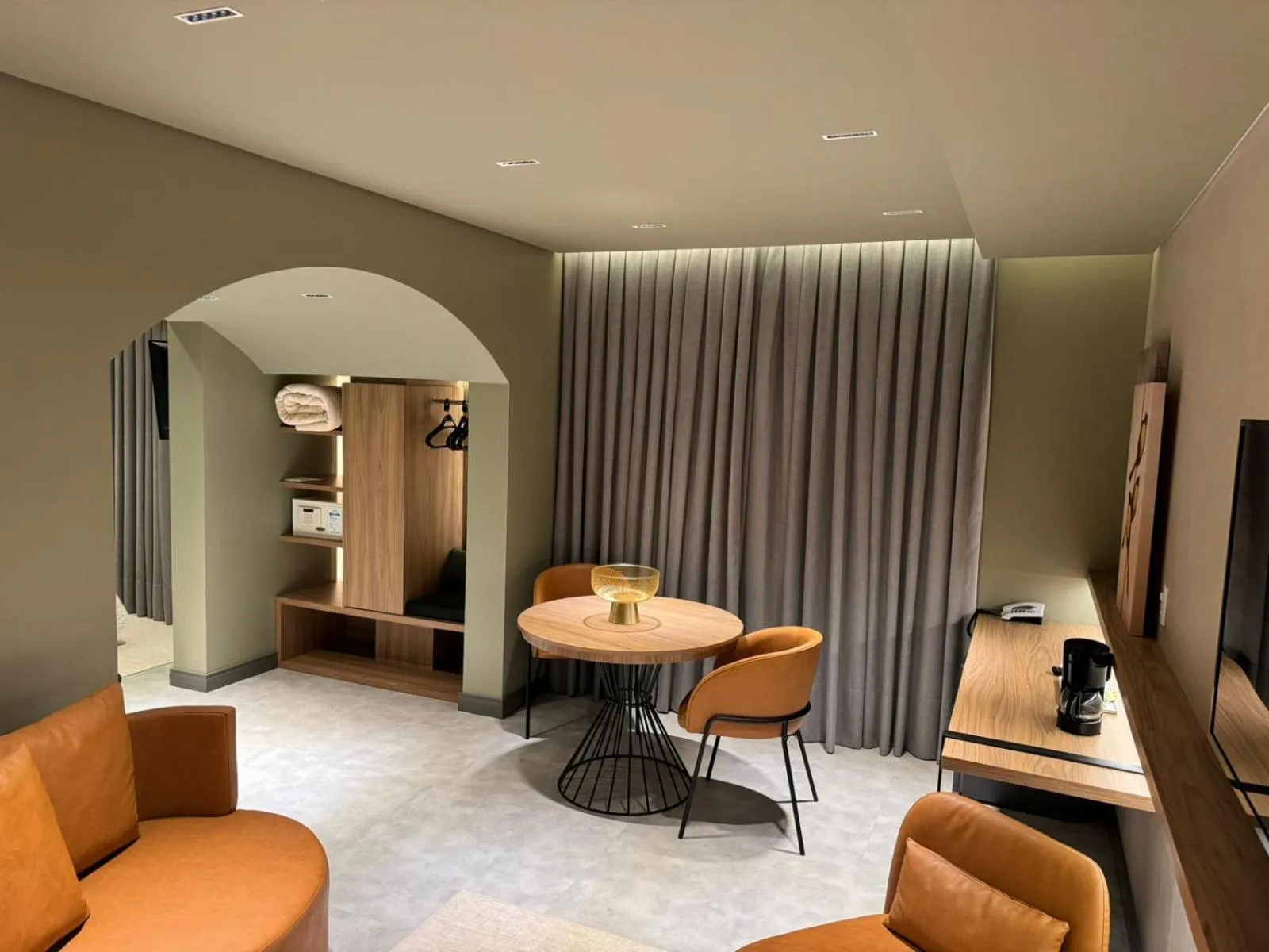 Living room in Mogano Premium Hotel - ELETROPOSTO