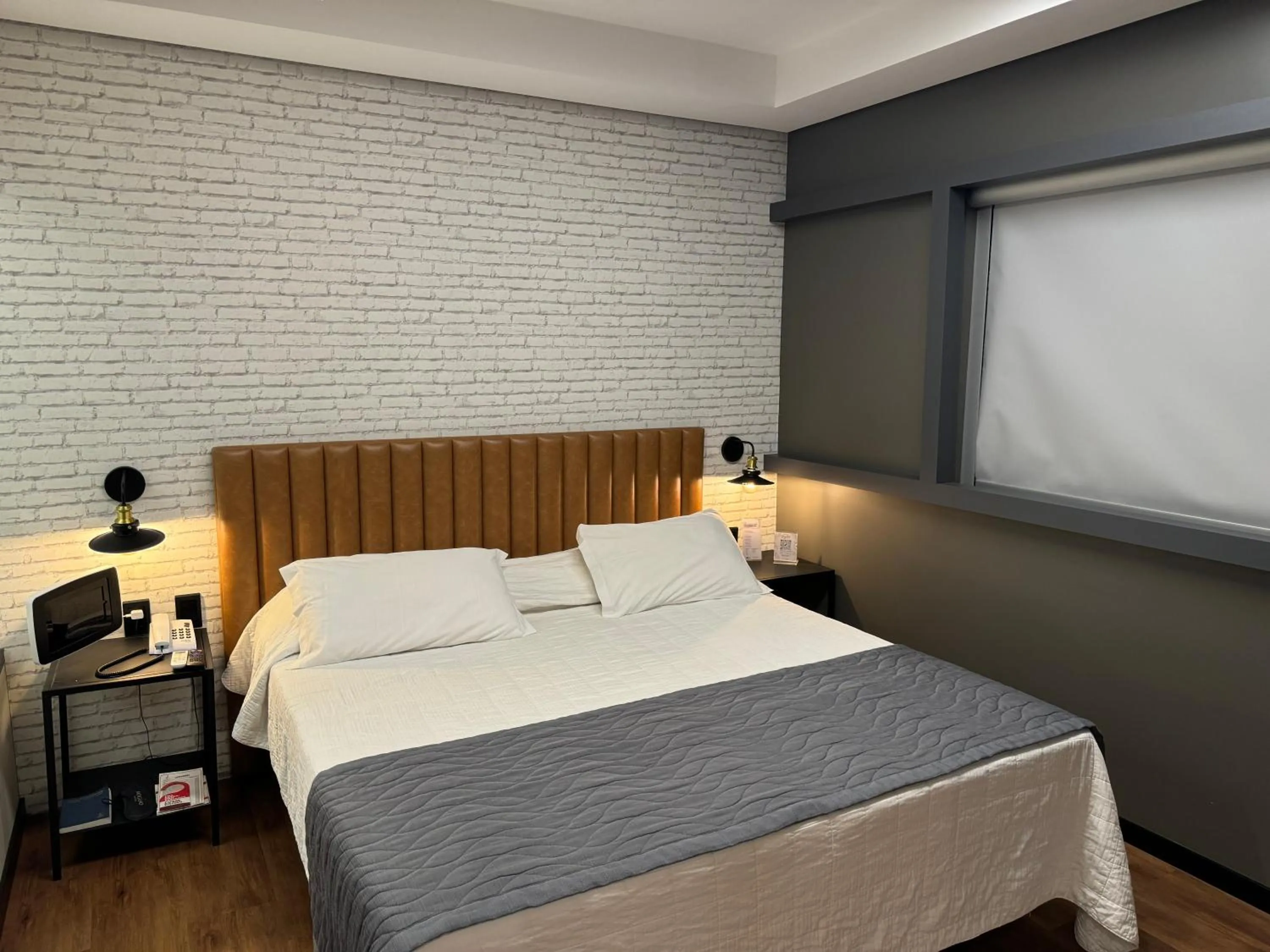 Bed in Mogano Premium Hotel - ELETROPOSTO