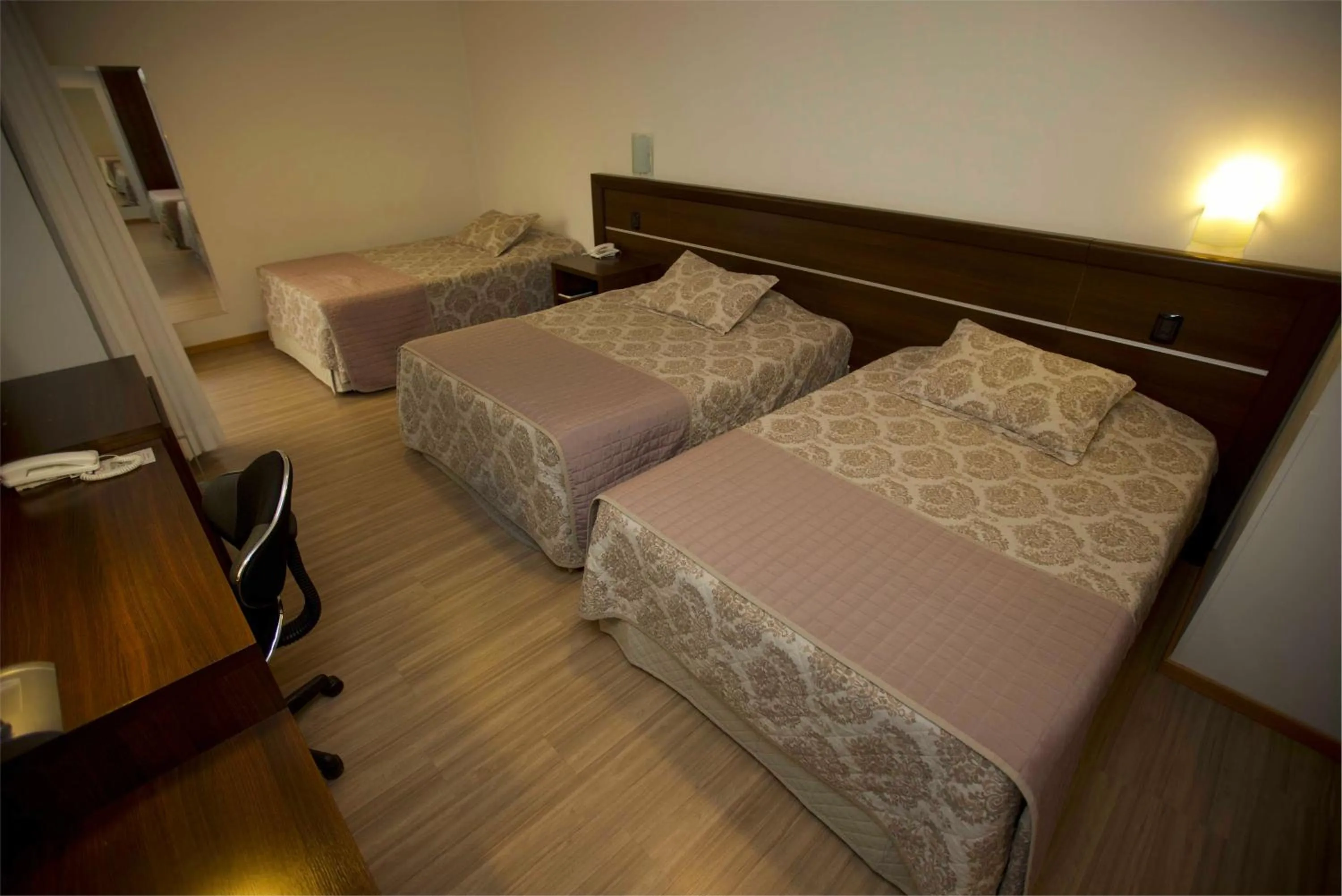 Bed in Mogano Premium Hotel - ELETROPOSTO