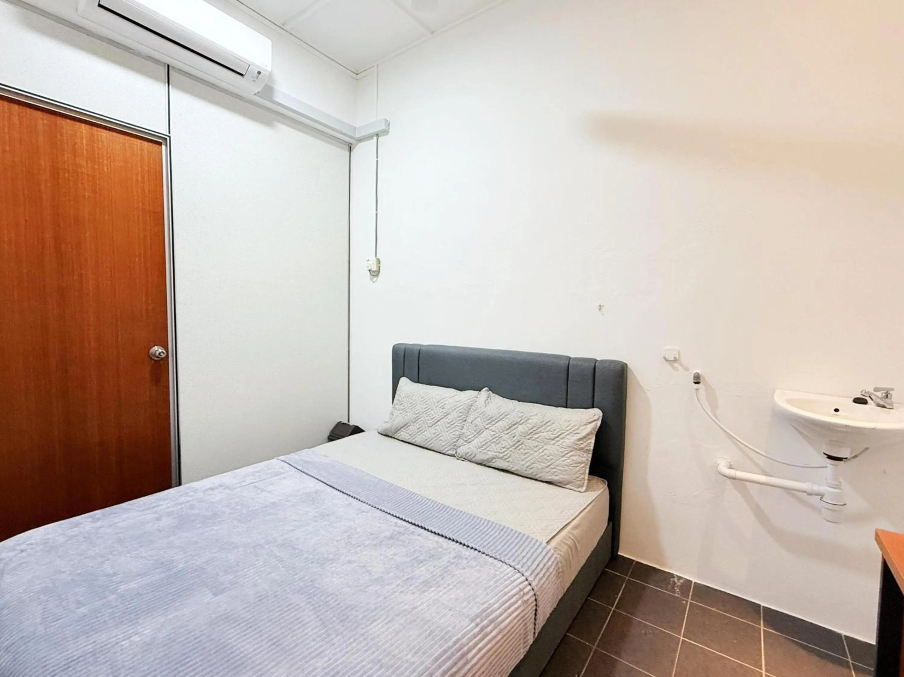 Bedroom, Bed in Hotel O S Homestay Premium