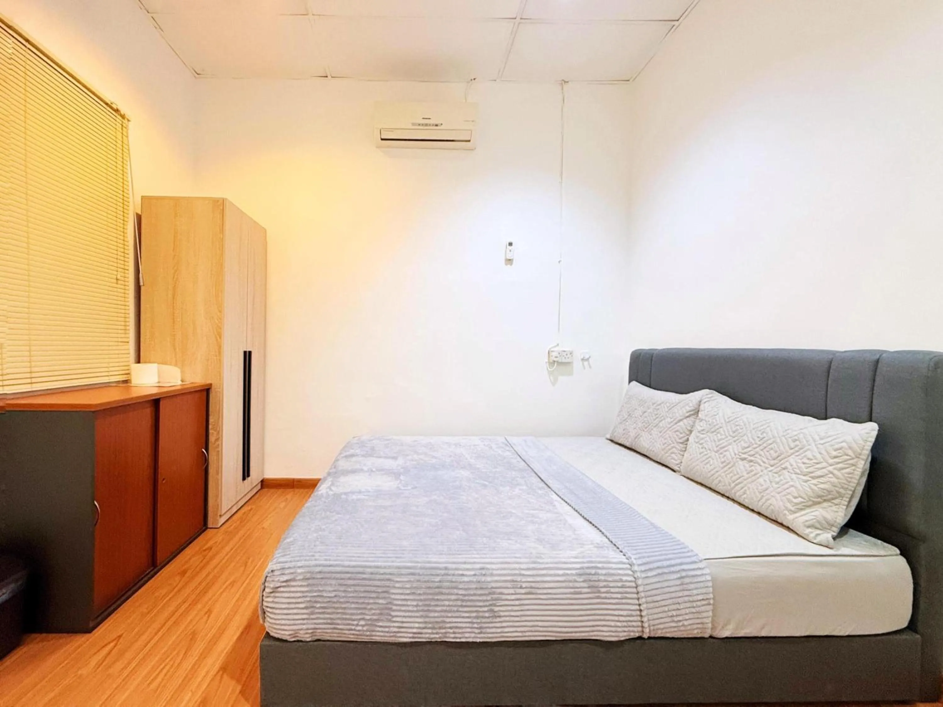 Bedroom, Bed in Hotel O S Homestay Premium