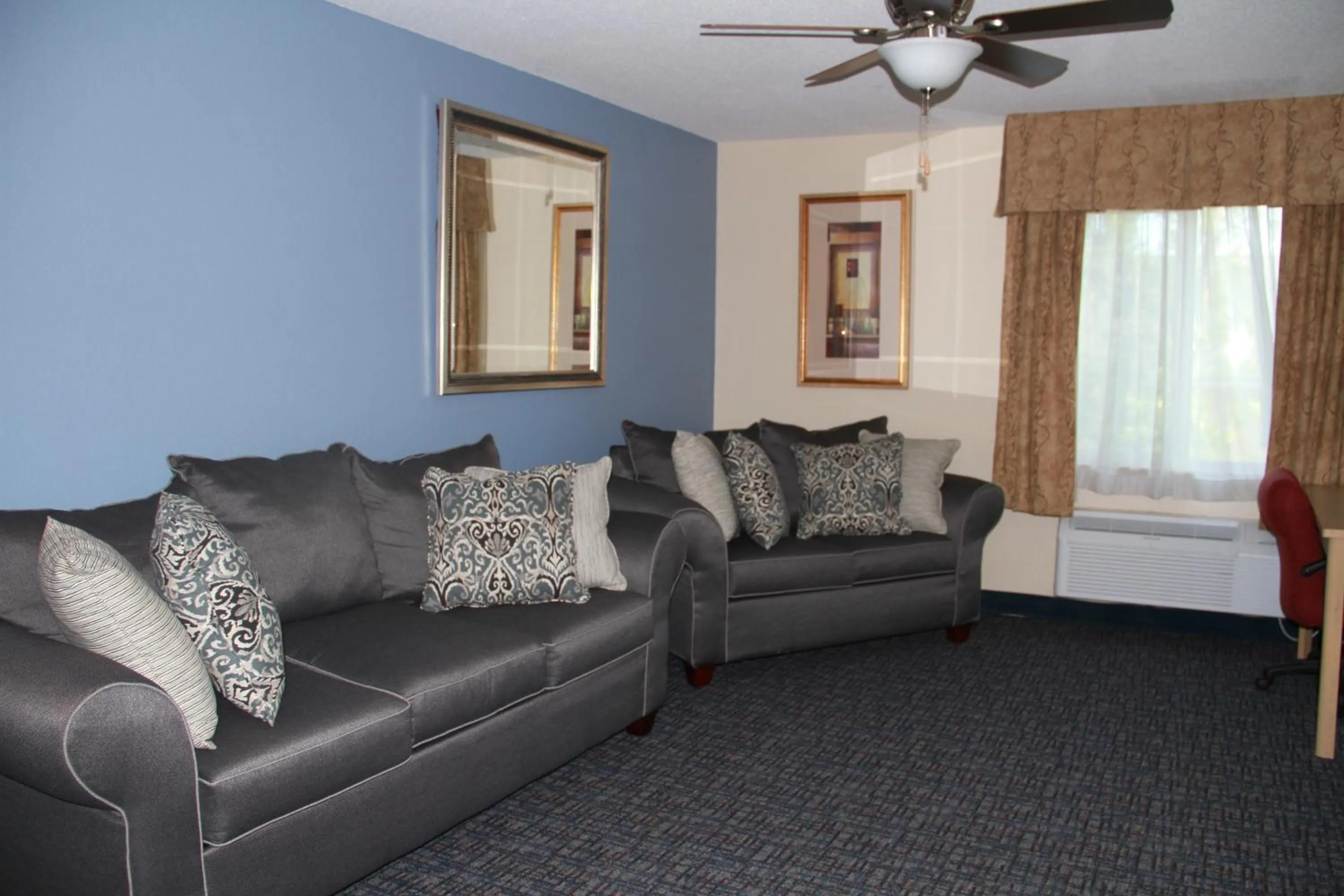 Living room in Baymont by Wyndham Stevens Point