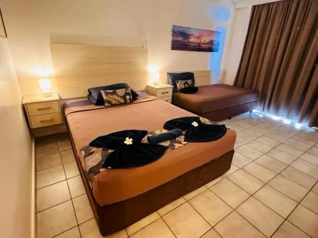 Bed in Dampier Mermaid Hotel Karratha