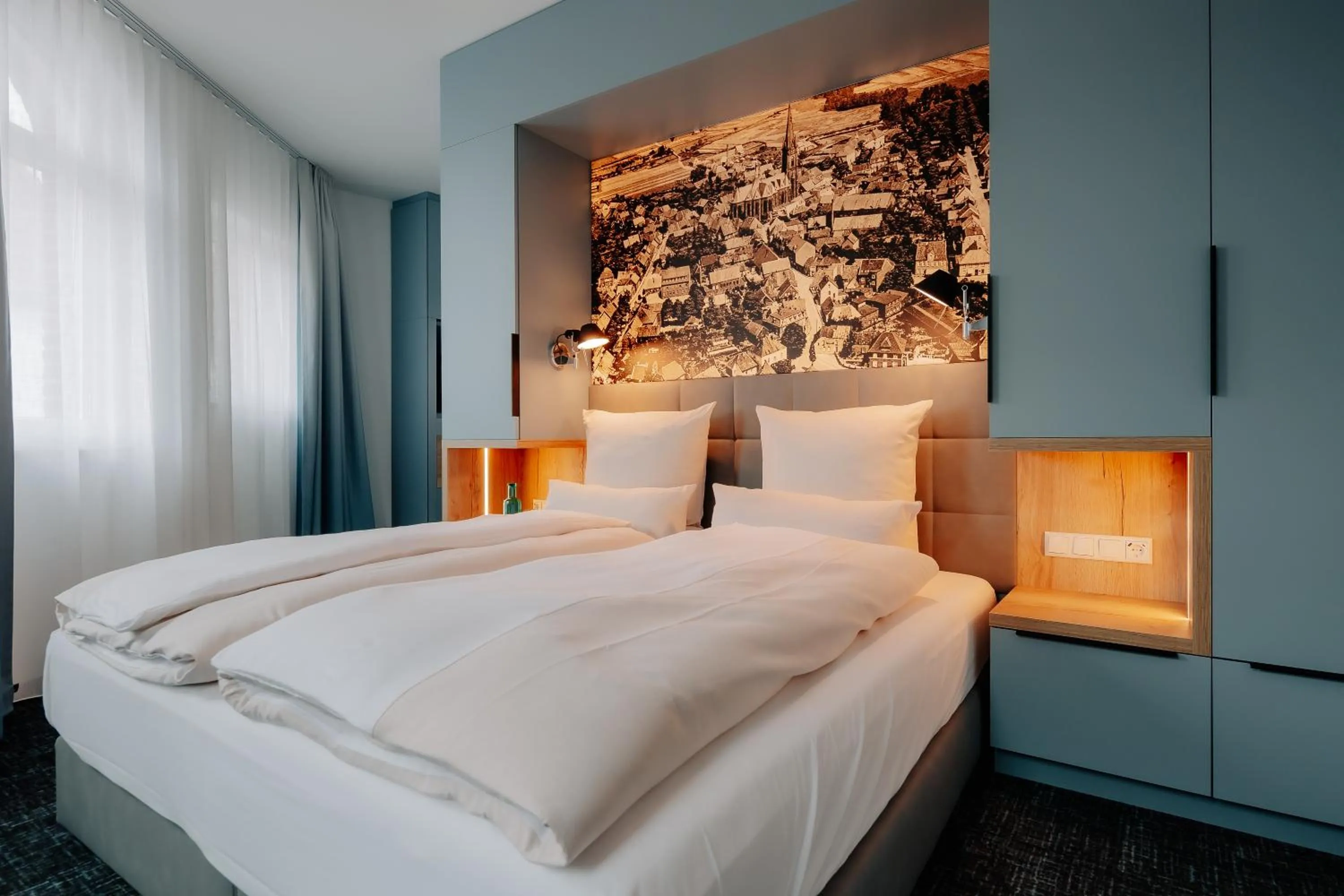 Photo of the whole room, Bed in Stadthöfe Rhede by Hackmann