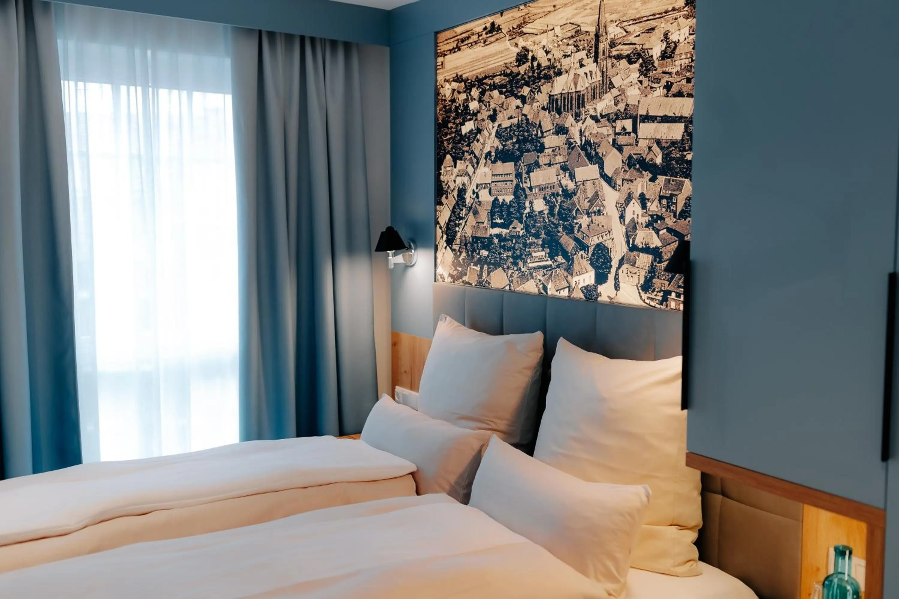 Photo of the whole room, Bed in Stadthöfe Rhede by Hackmann