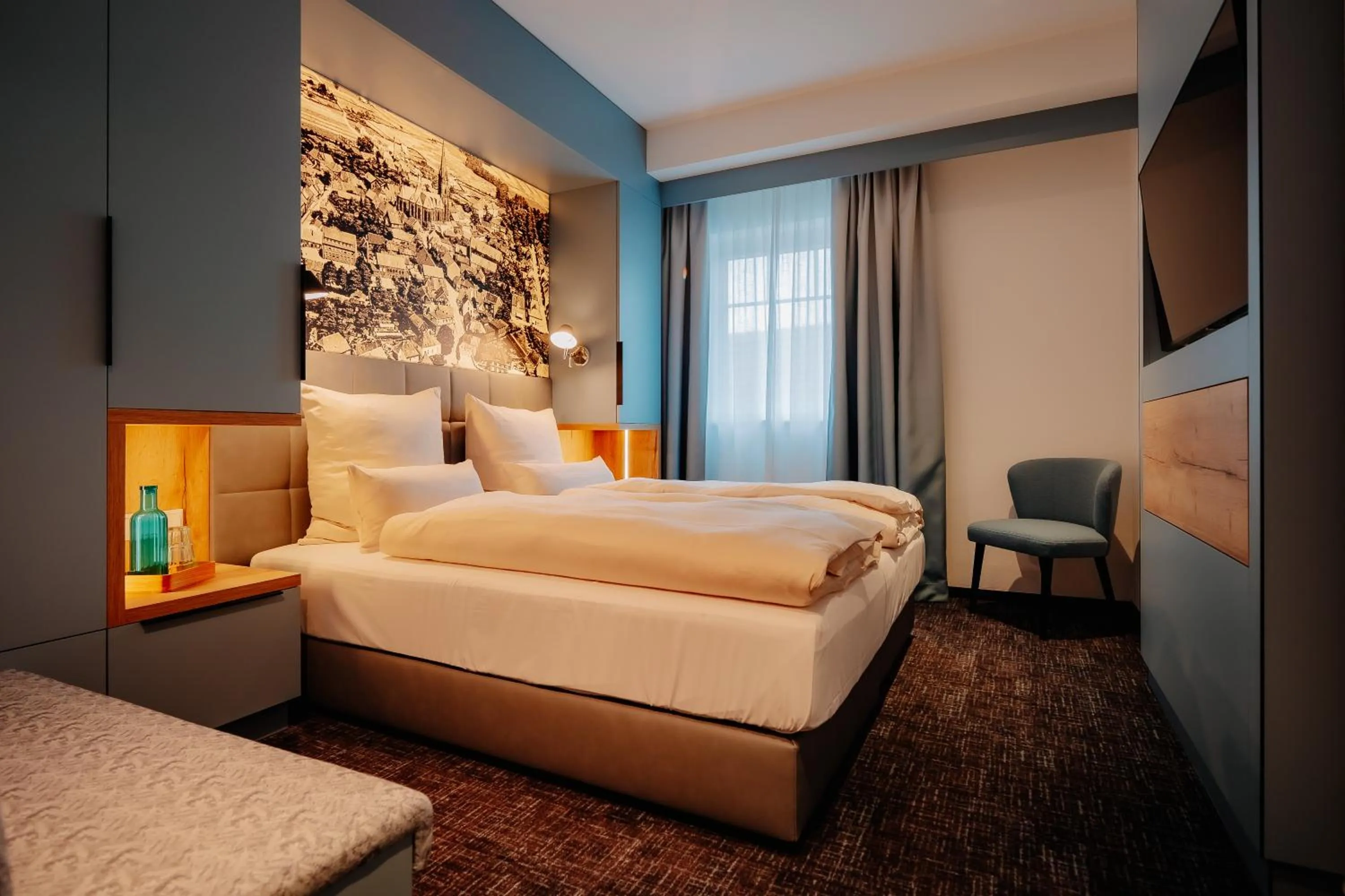 Photo of the whole room, Bed in Stadthöfe Rhede by Hackmann