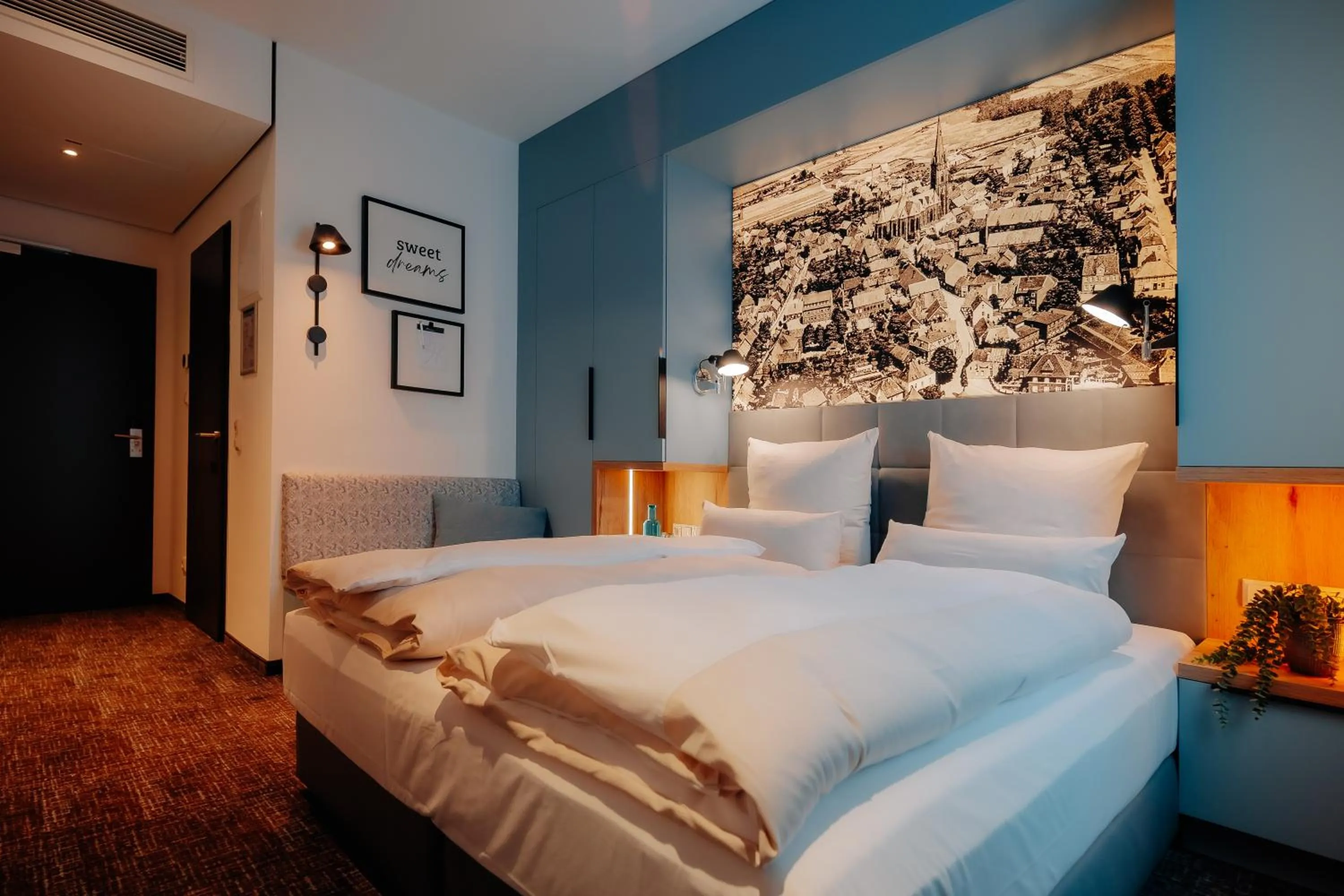 Photo of the whole room, Bed in Stadthöfe Rhede by Hackmann