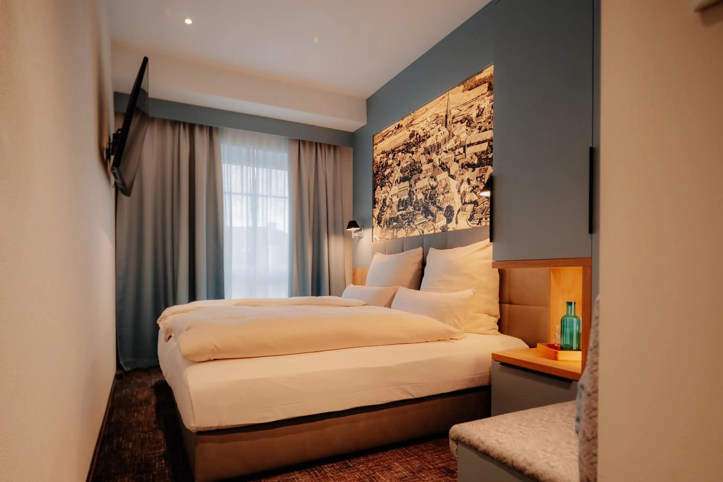 Photo of the whole room, Bed in Stadthöfe Rhede by Hackmann