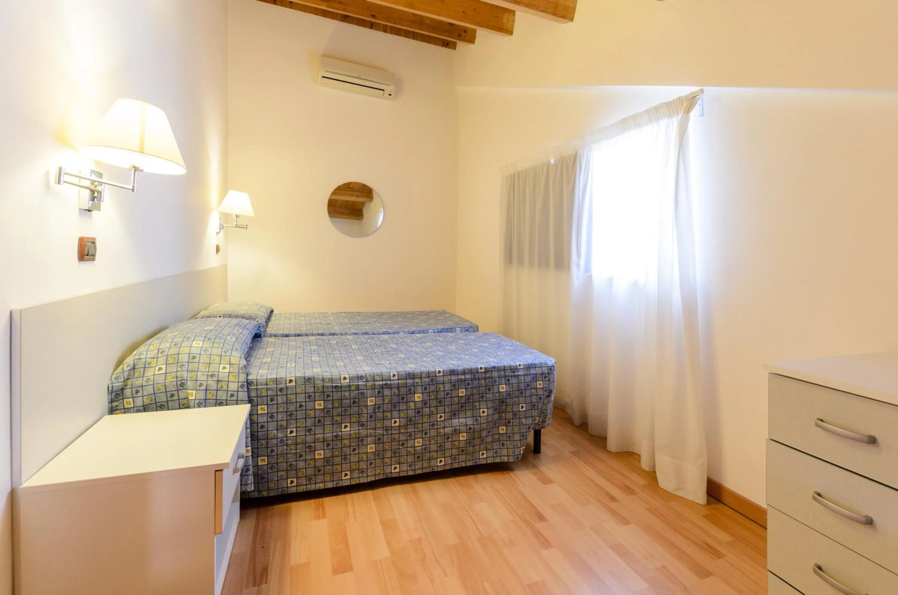 Bed in Le Tartarughe Aparthotel