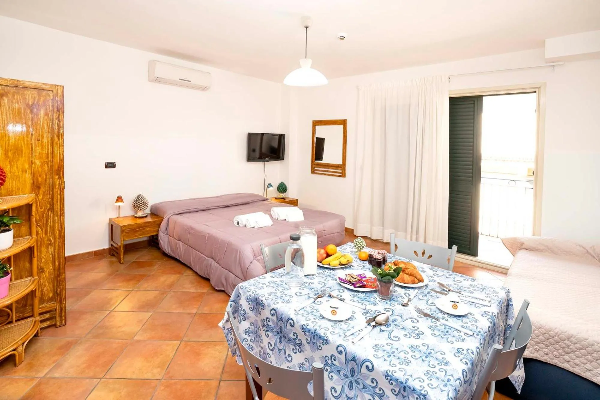 Bed in Le Tartarughe Aparthotel