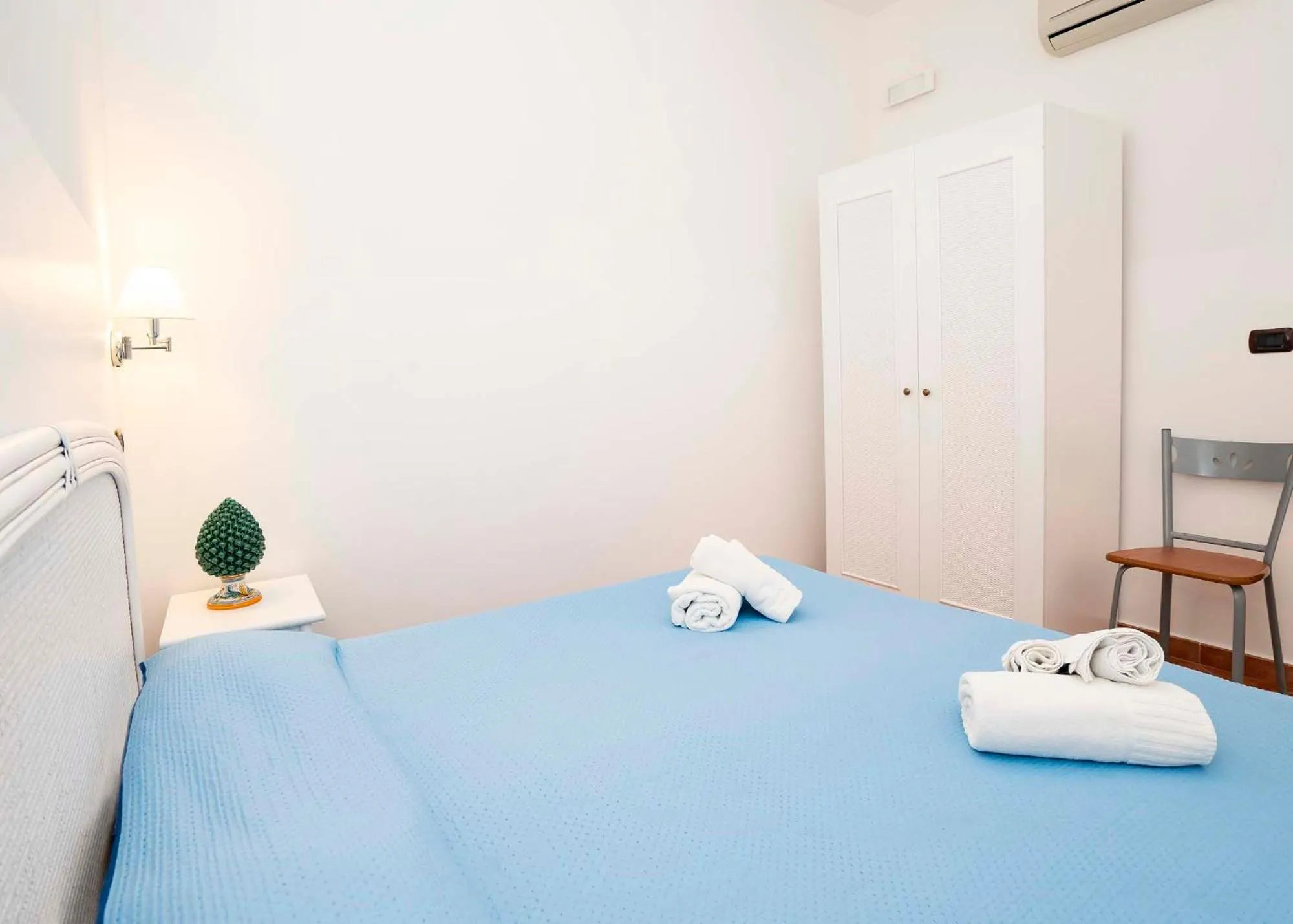 Bed in Le Tartarughe Aparthotel