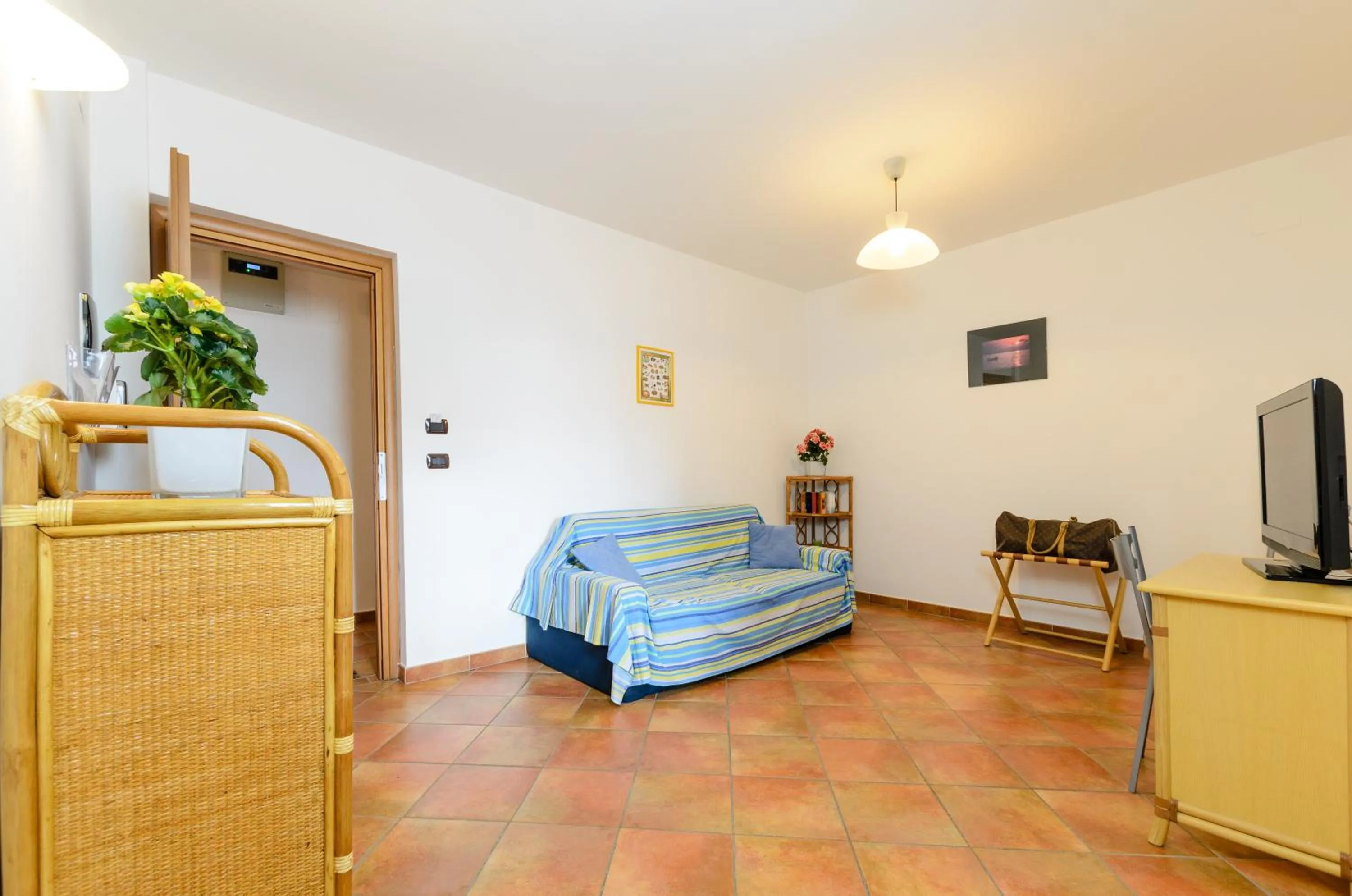 Bed in Le Tartarughe Aparthotel