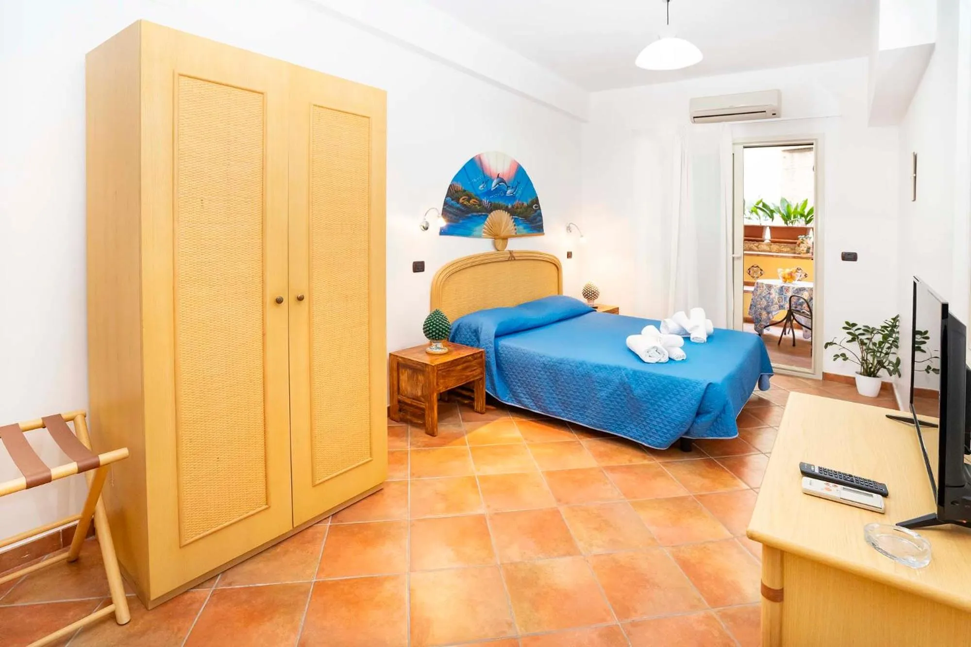 Bed in Le Tartarughe Aparthotel