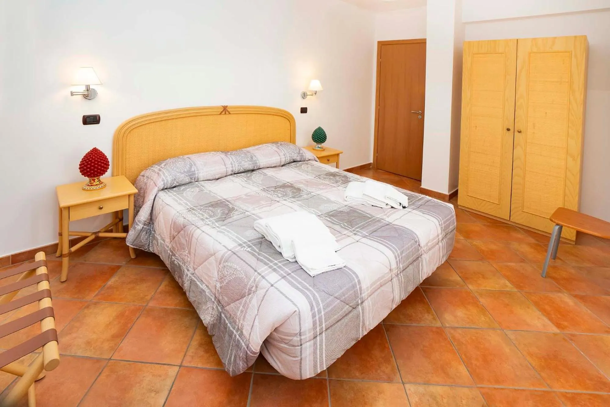 Bed in Le Tartarughe Aparthotel