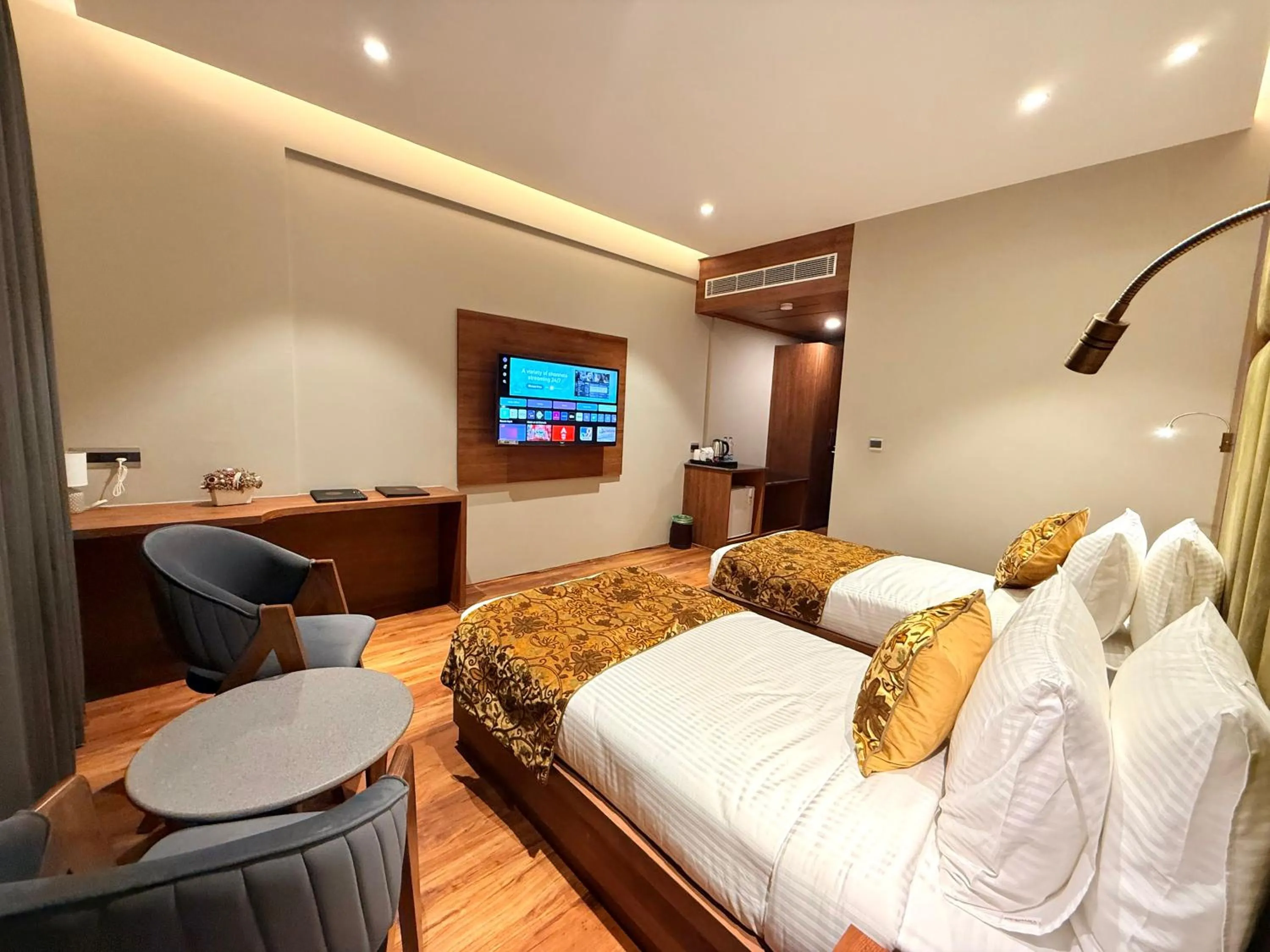 Bed in The Olive Hotel Srinagar