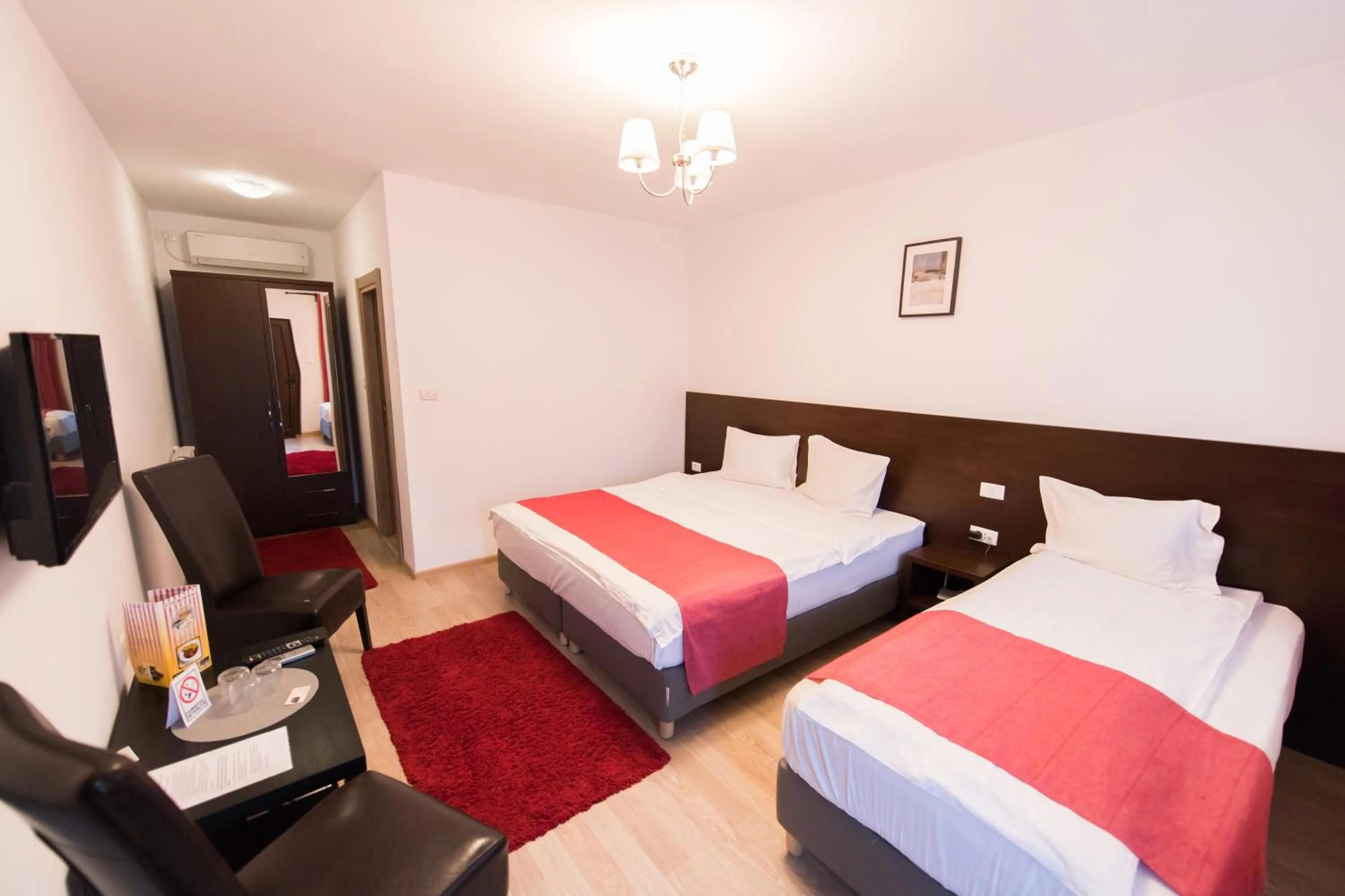 Bed in Pensiunea Puiu