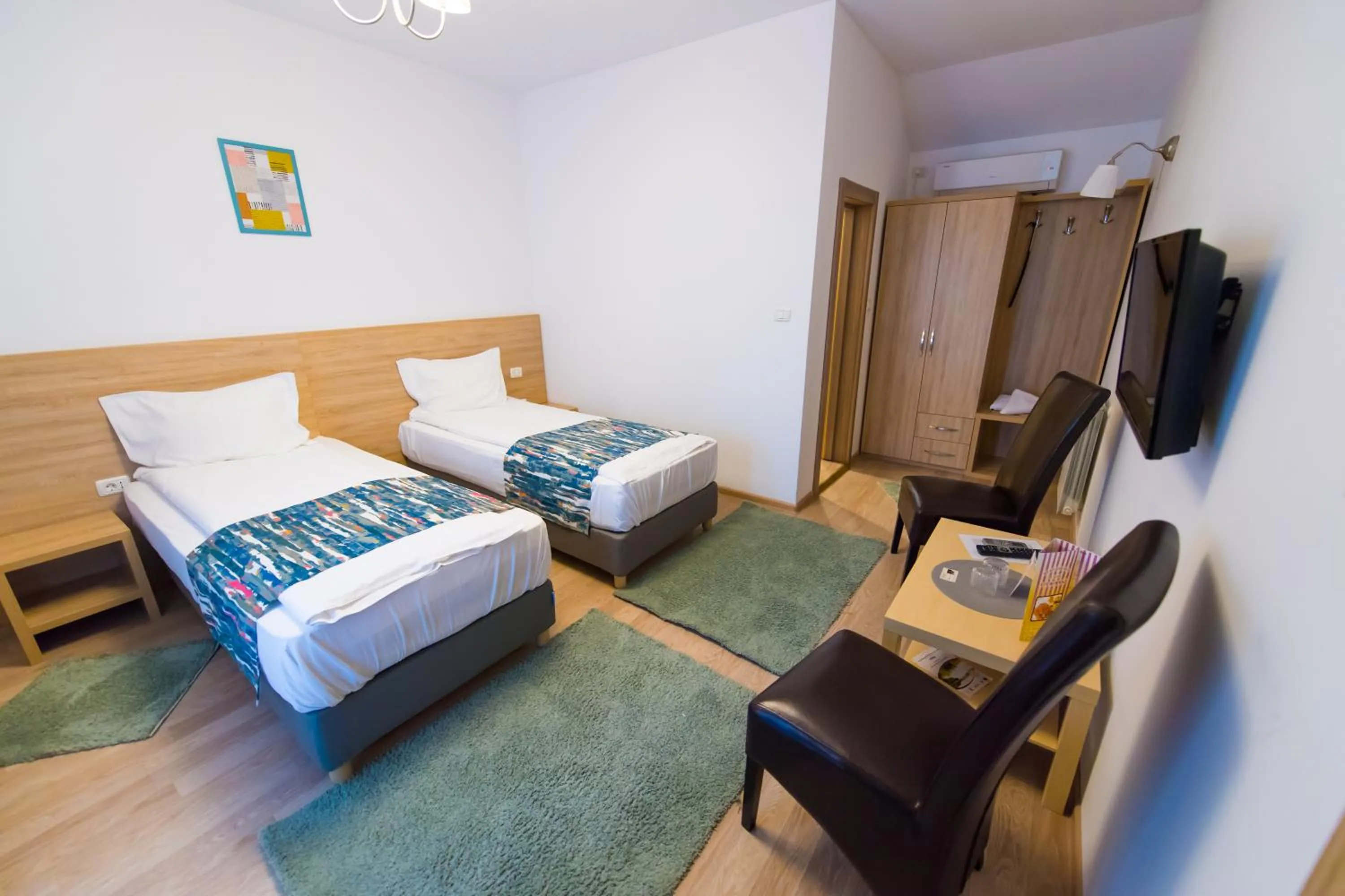 Bed in Pensiunea Puiu