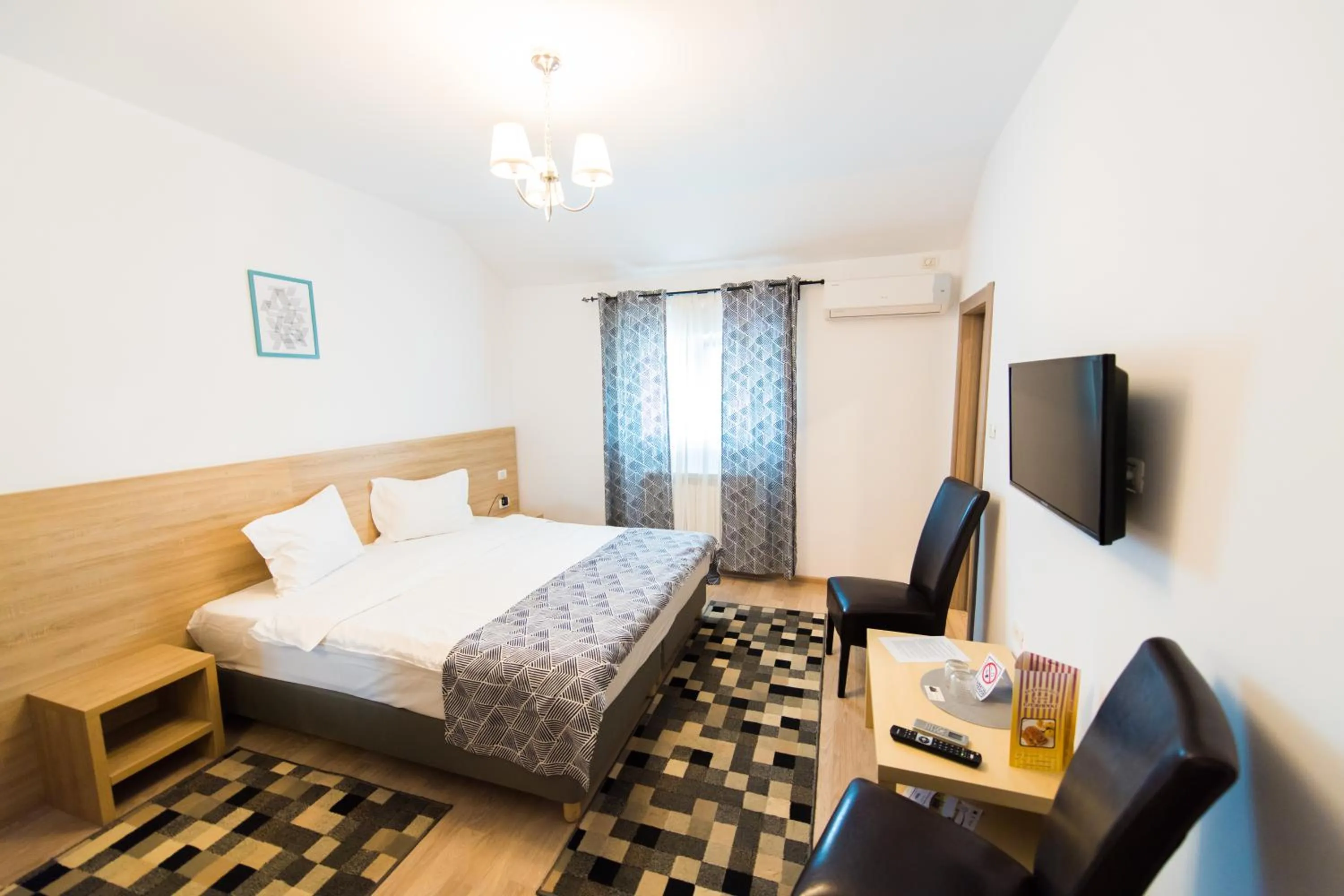 Bed in Pensiunea Puiu