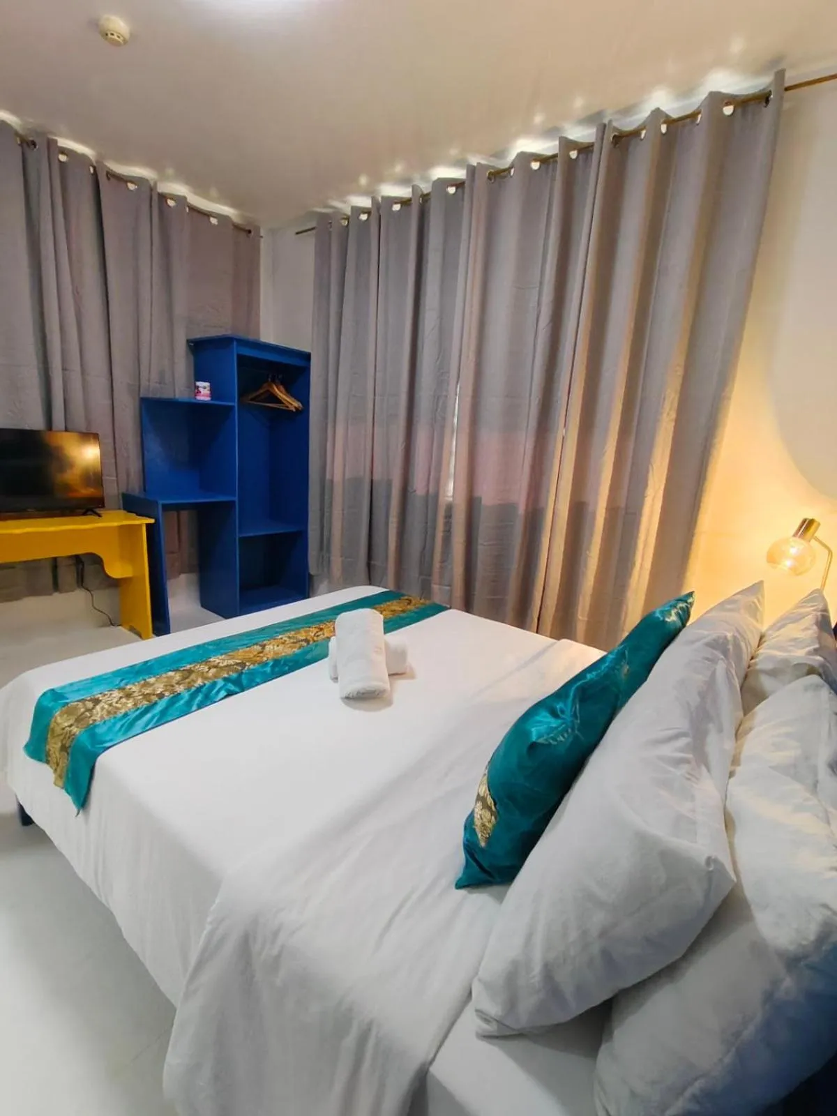 Bed in Northland Resort Hotel Manapla