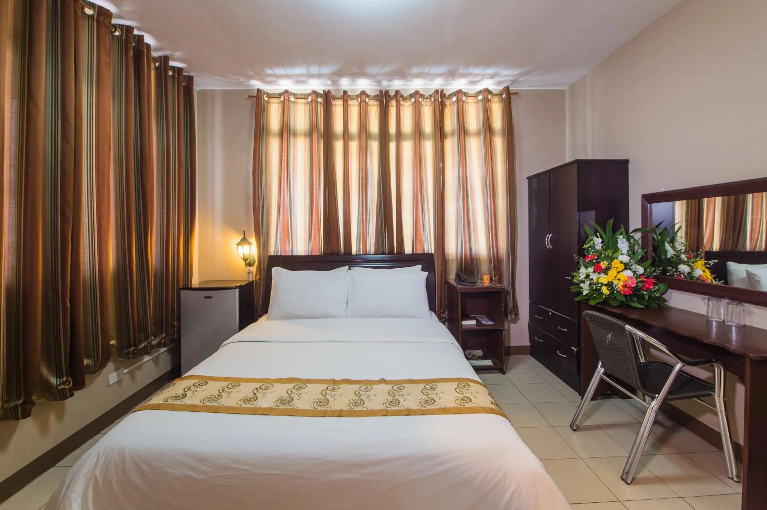 Bed in Northland Resort Hotel Manapla