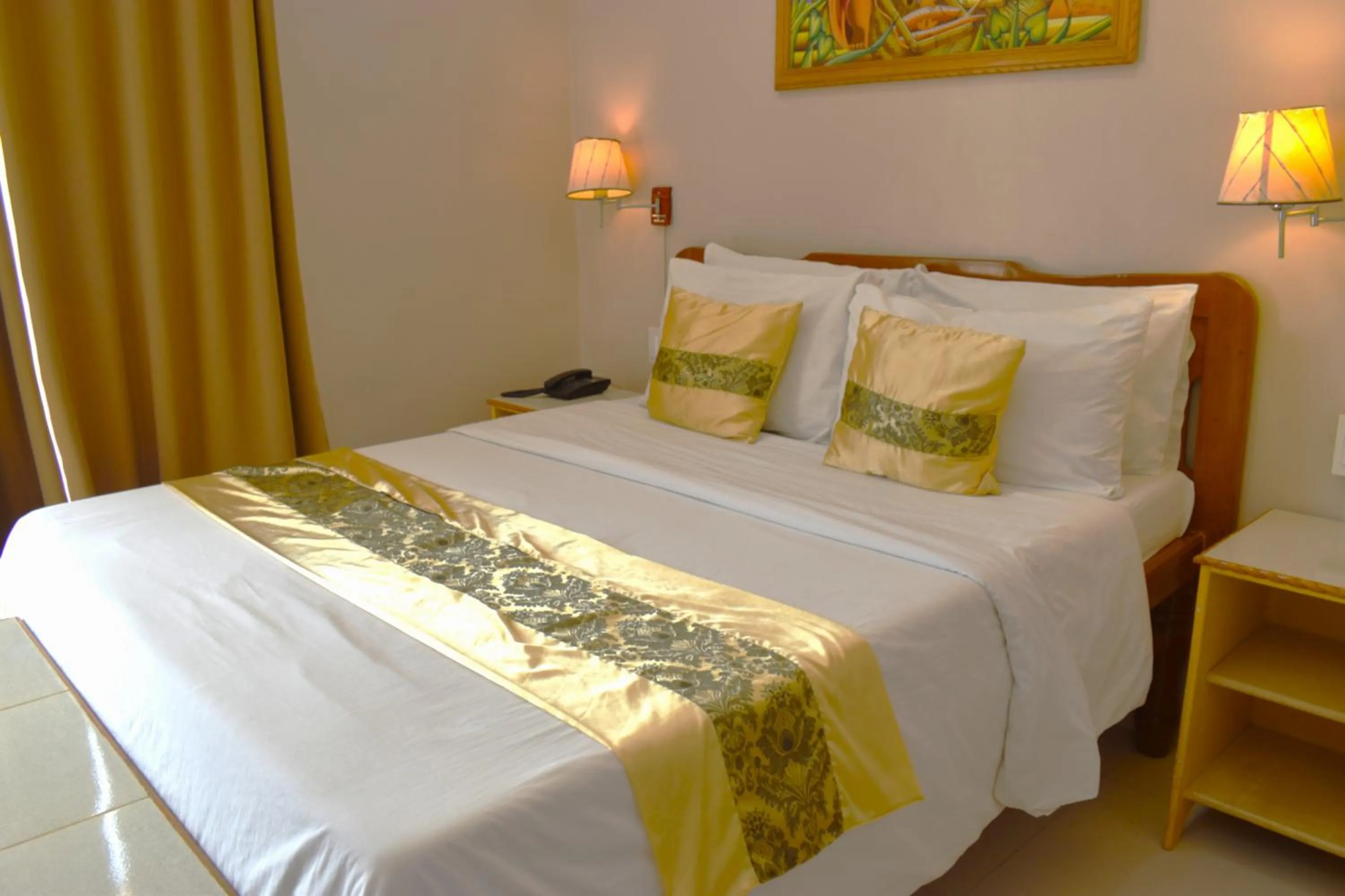 Bed in Northland Resort Hotel Manapla