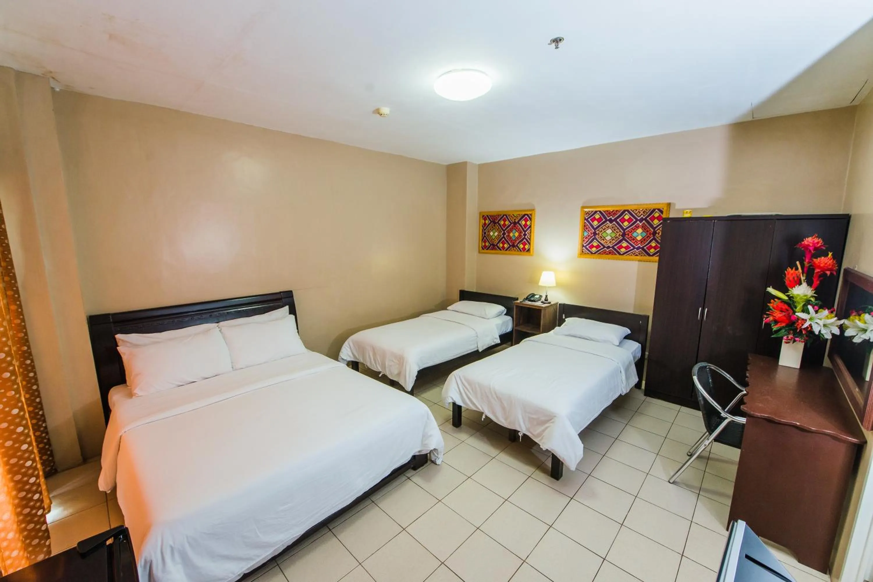 Bed in Northland Resort Hotel Manapla