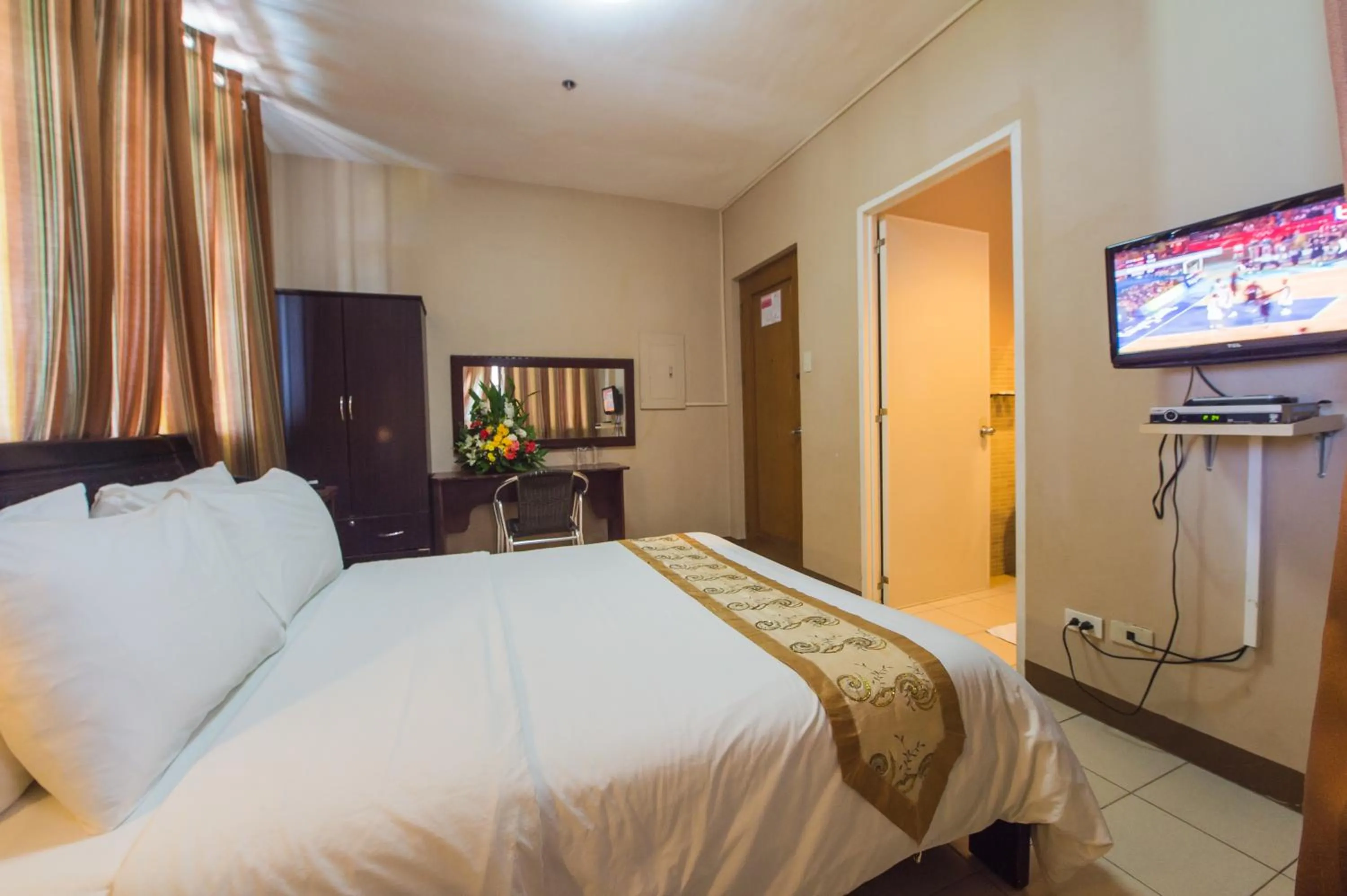 Bed in Northland Resort Hotel Manapla