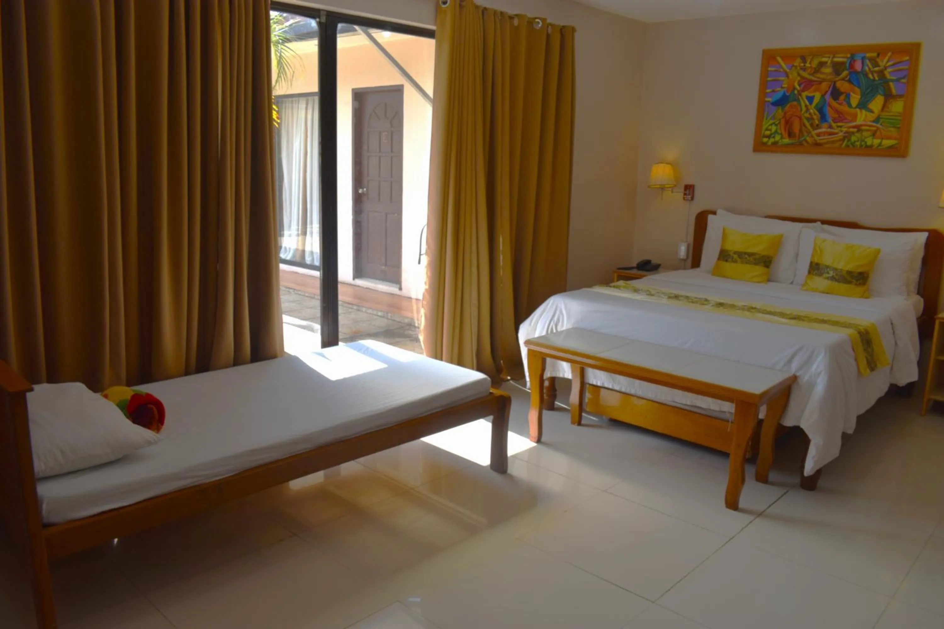 Bed in Northland Resort Hotel Manapla