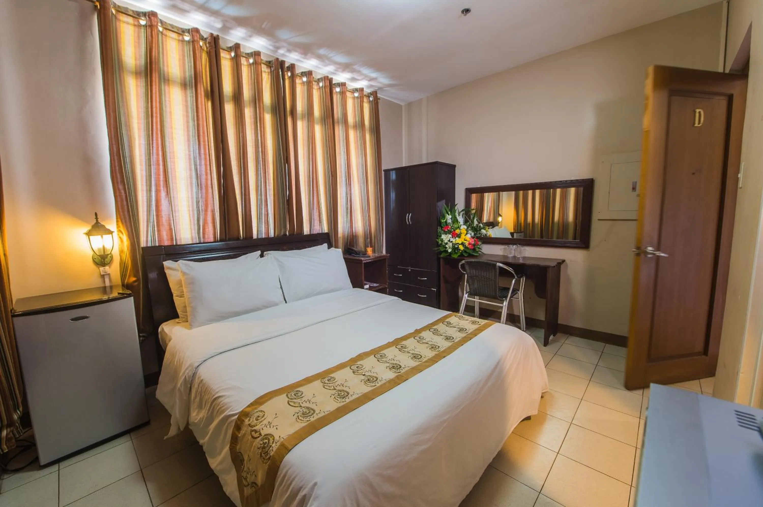Bed in Northland Resort Hotel Manapla