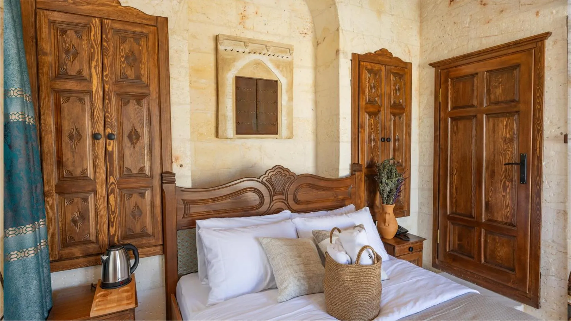 Bed in Stone House by Cevahir