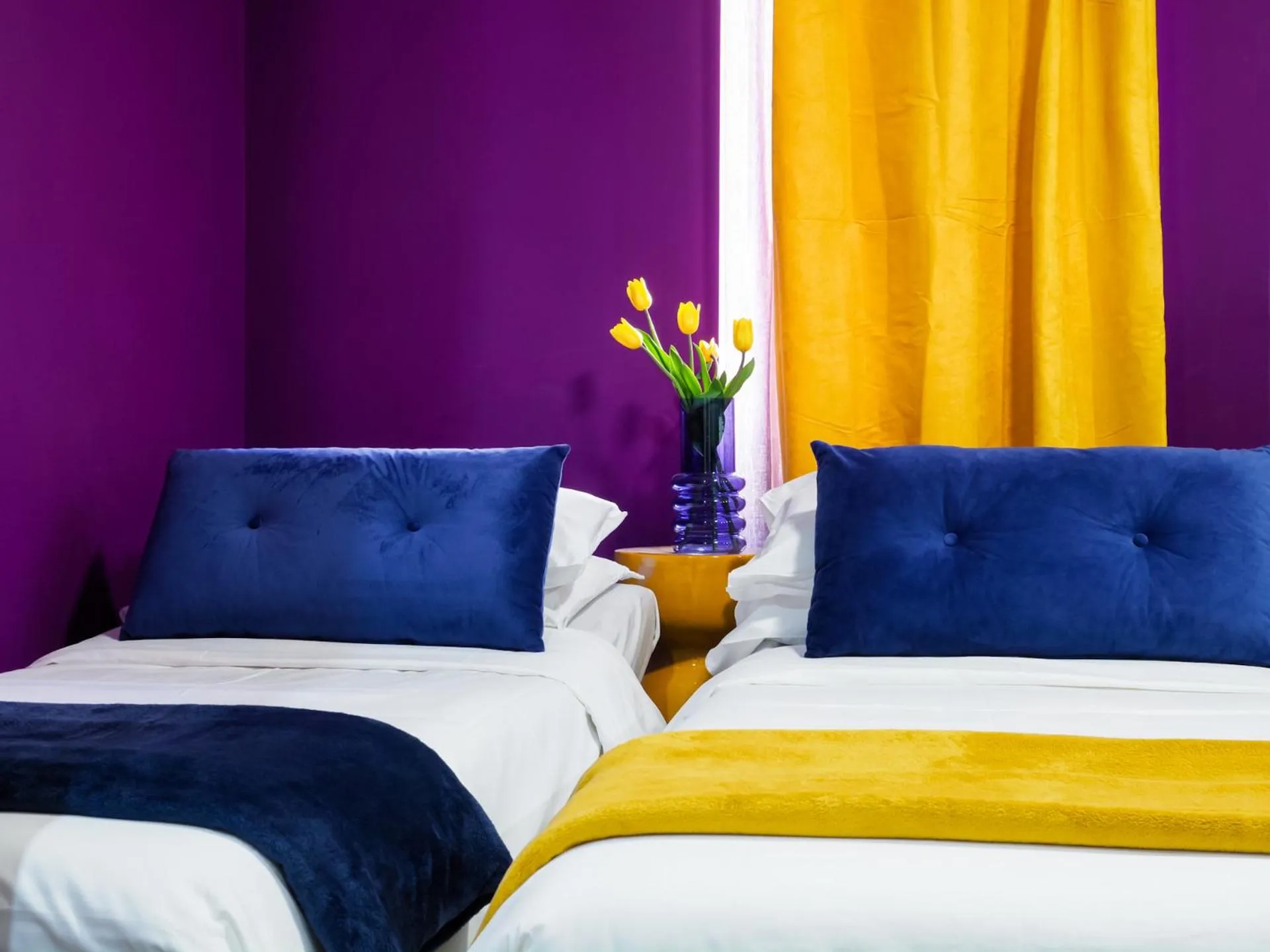 Bed in C'est La Vie Suites