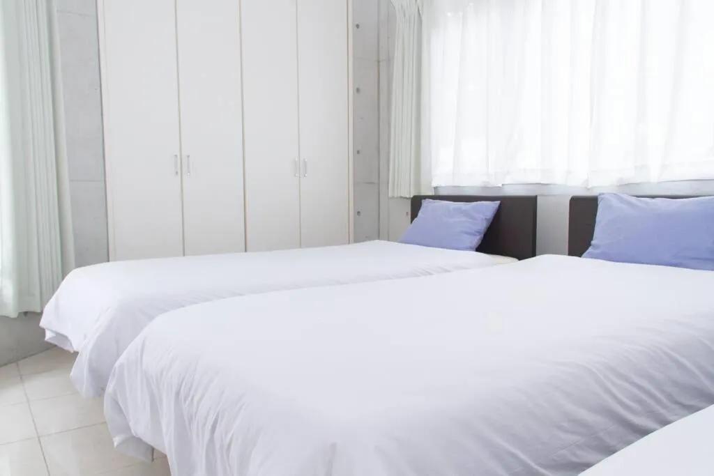 Bed in Shiraho Villa