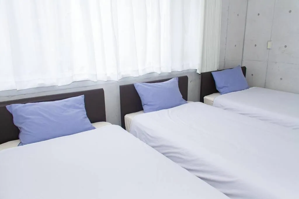 Bed in Shiraho Villa