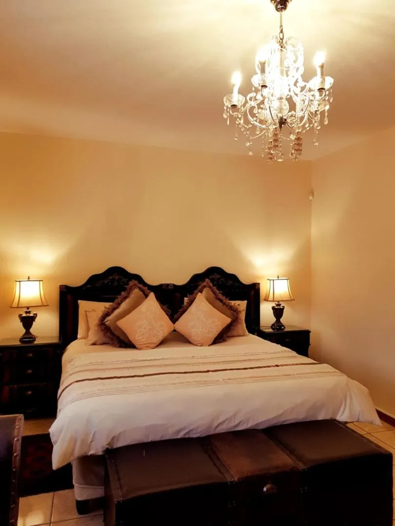 Bed in Kimberley Manor Guesthouse