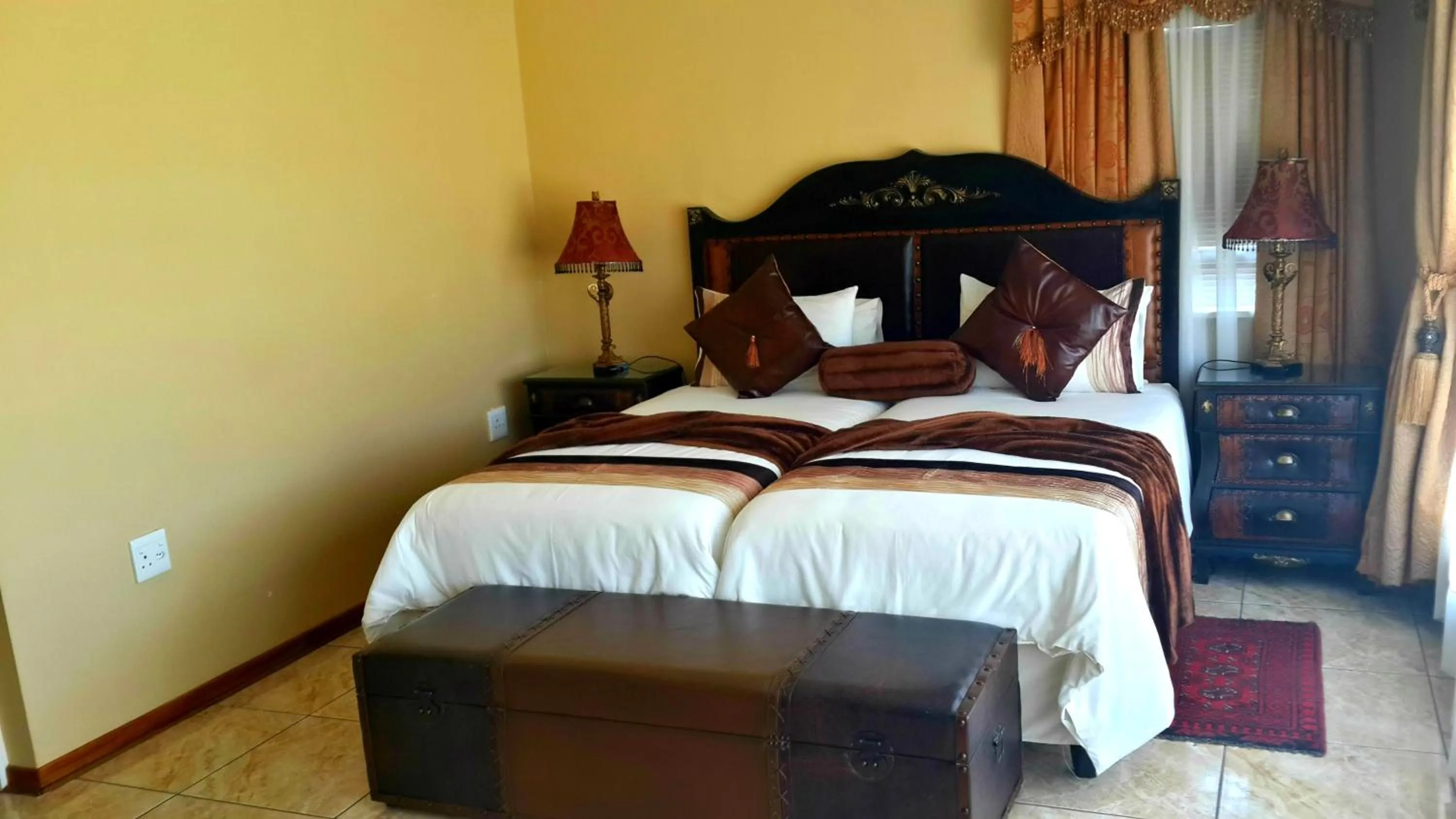 Bed in Kimberley Manor Guesthouse