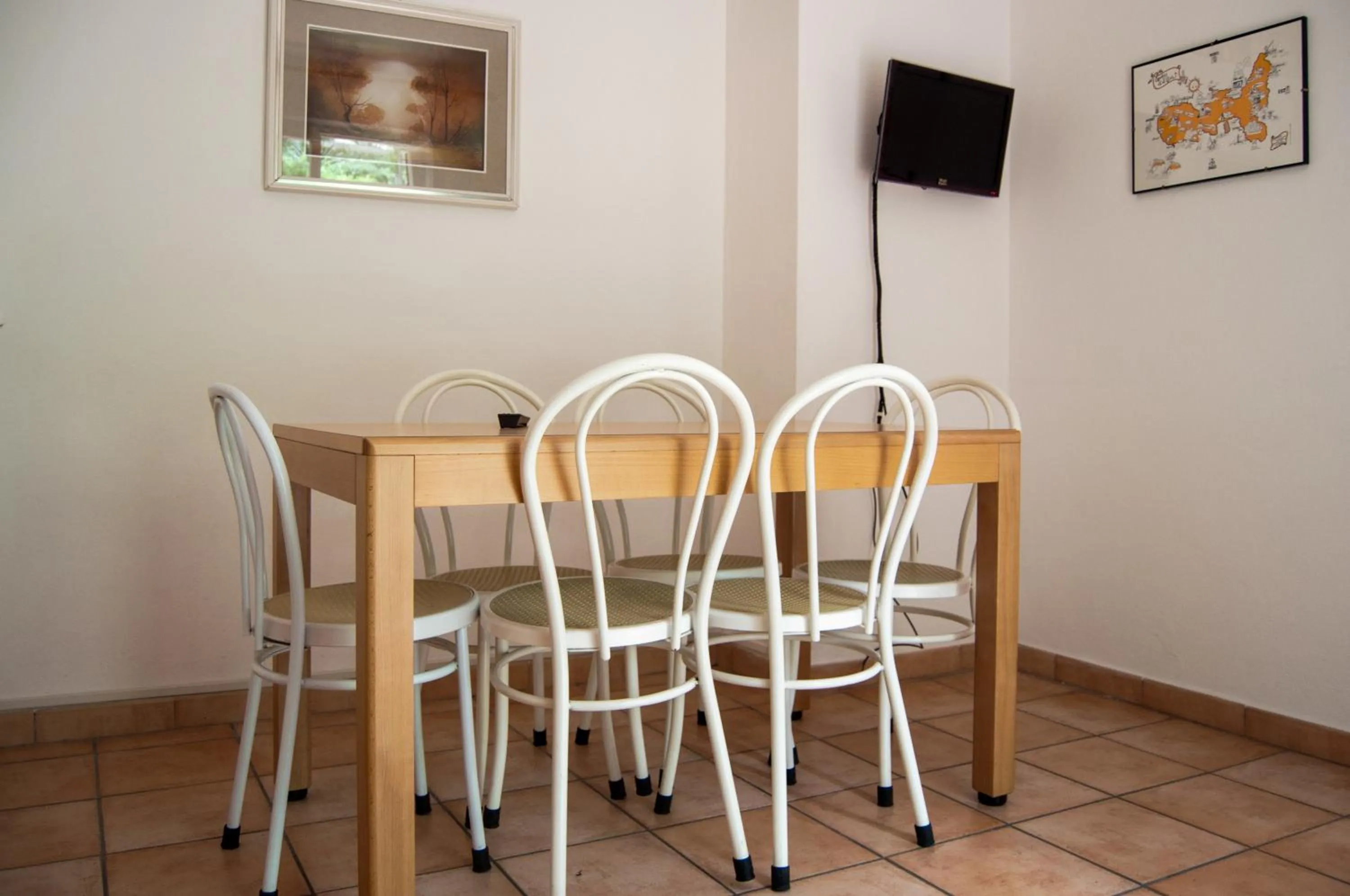 Dining area in Residence Le Mimose