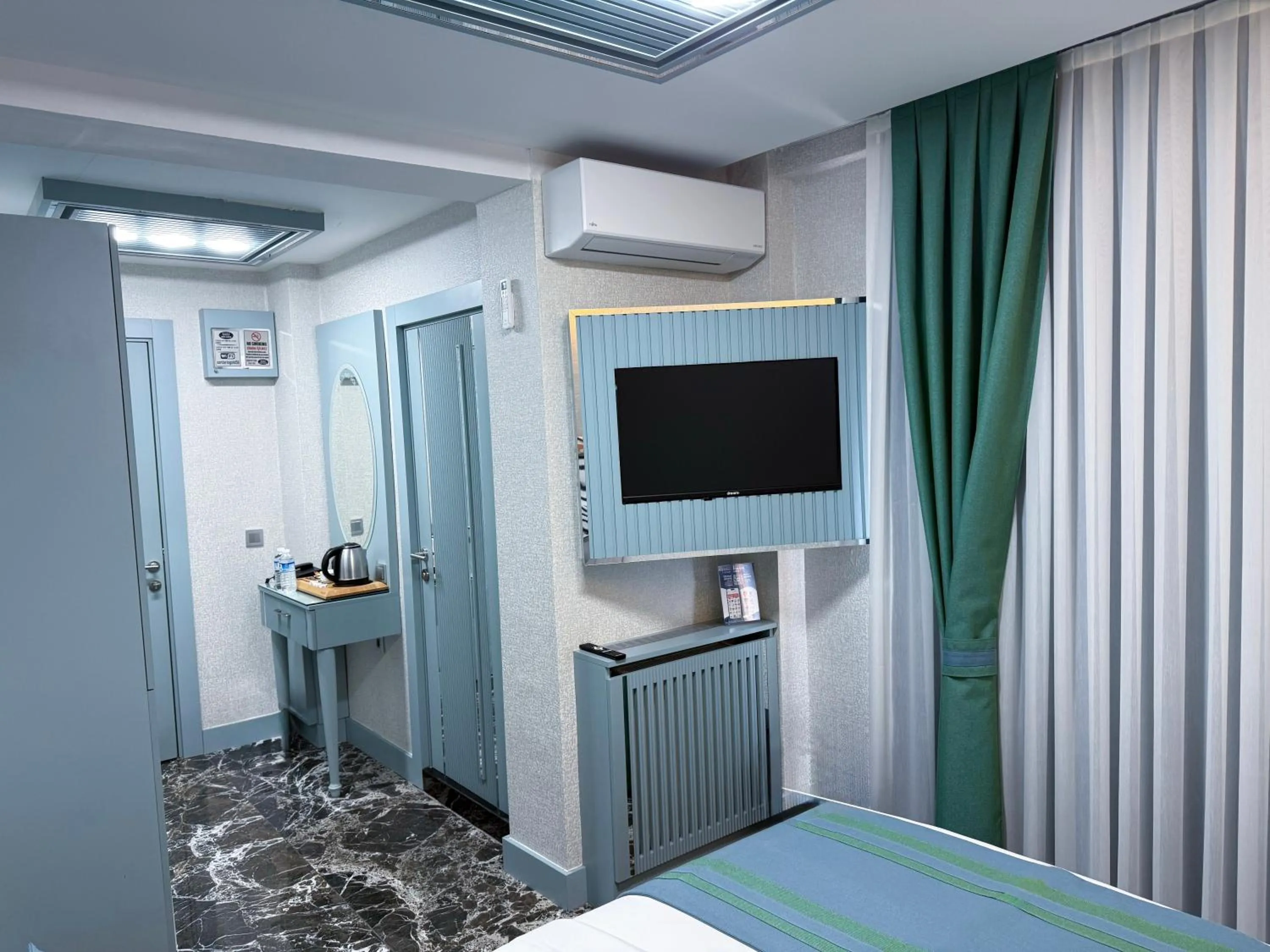 Bed in Santa Rio Gold Taxim Hotel