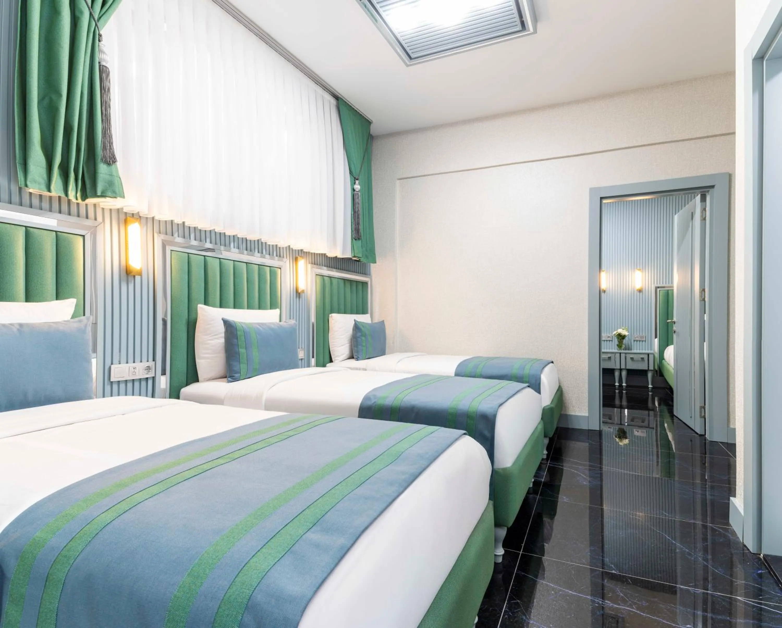 Photo of the whole room, Bed in Santa Rio Gold Taxim Hotel