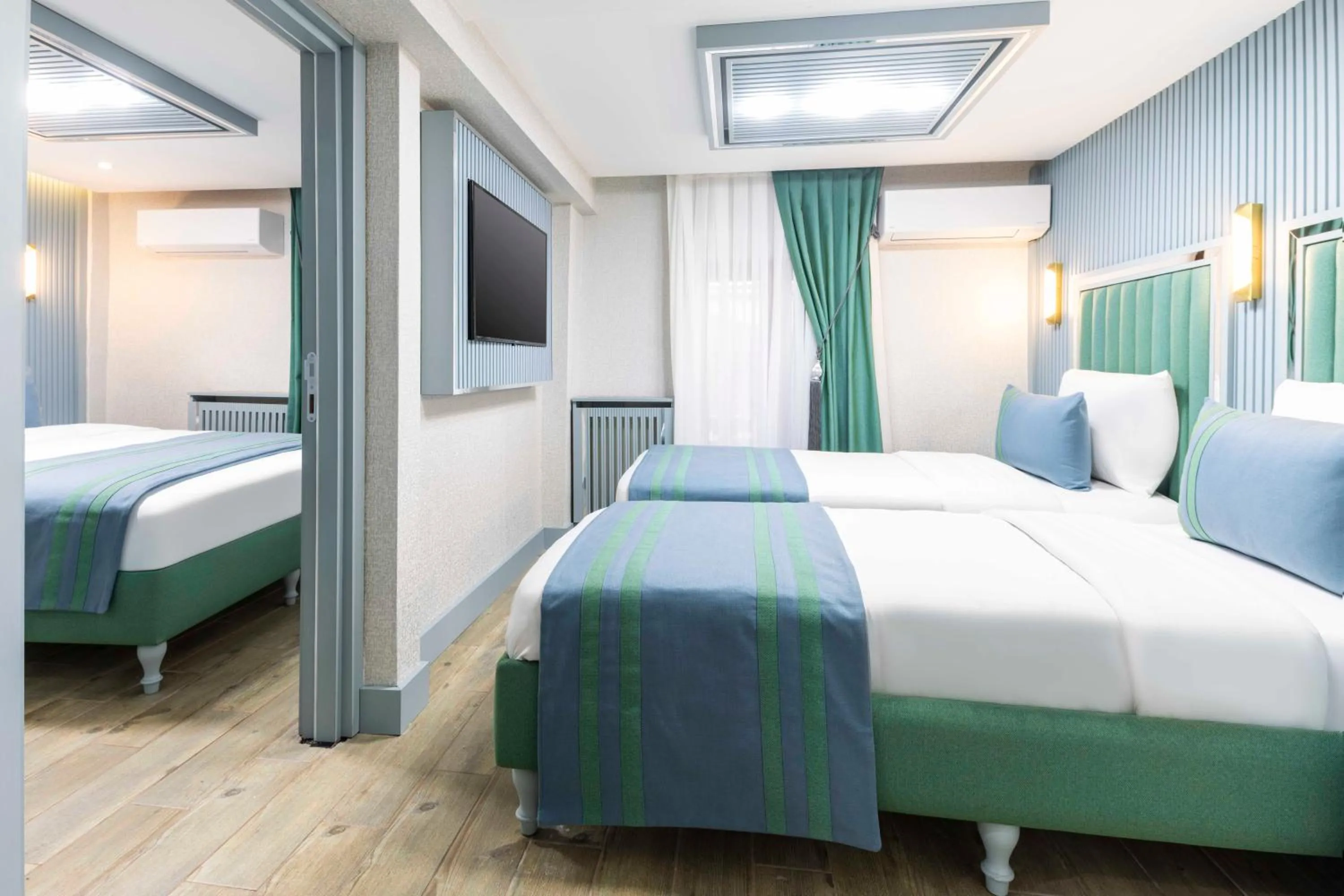 Bed in Santa Rio Gold Taxim Hotel