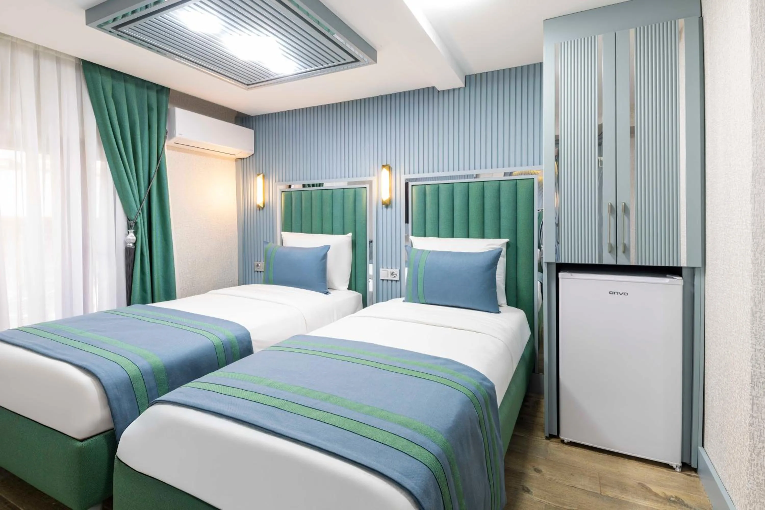 Bed in Santa Rio Gold Taxim Hotel